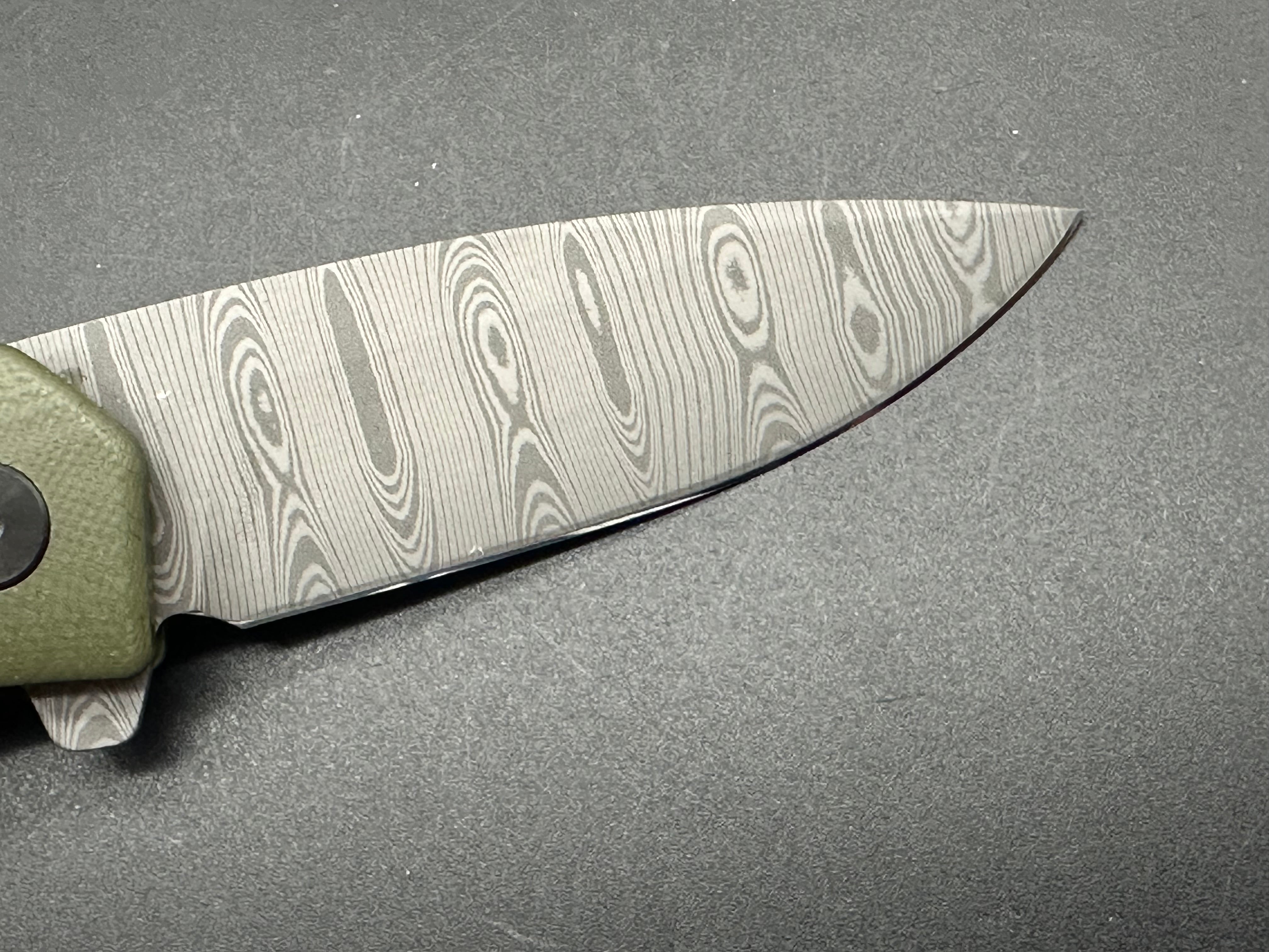 Asher Knives The Spiro flipper OD green G10 S35VN LNIB - blem Lasered ladder damascus