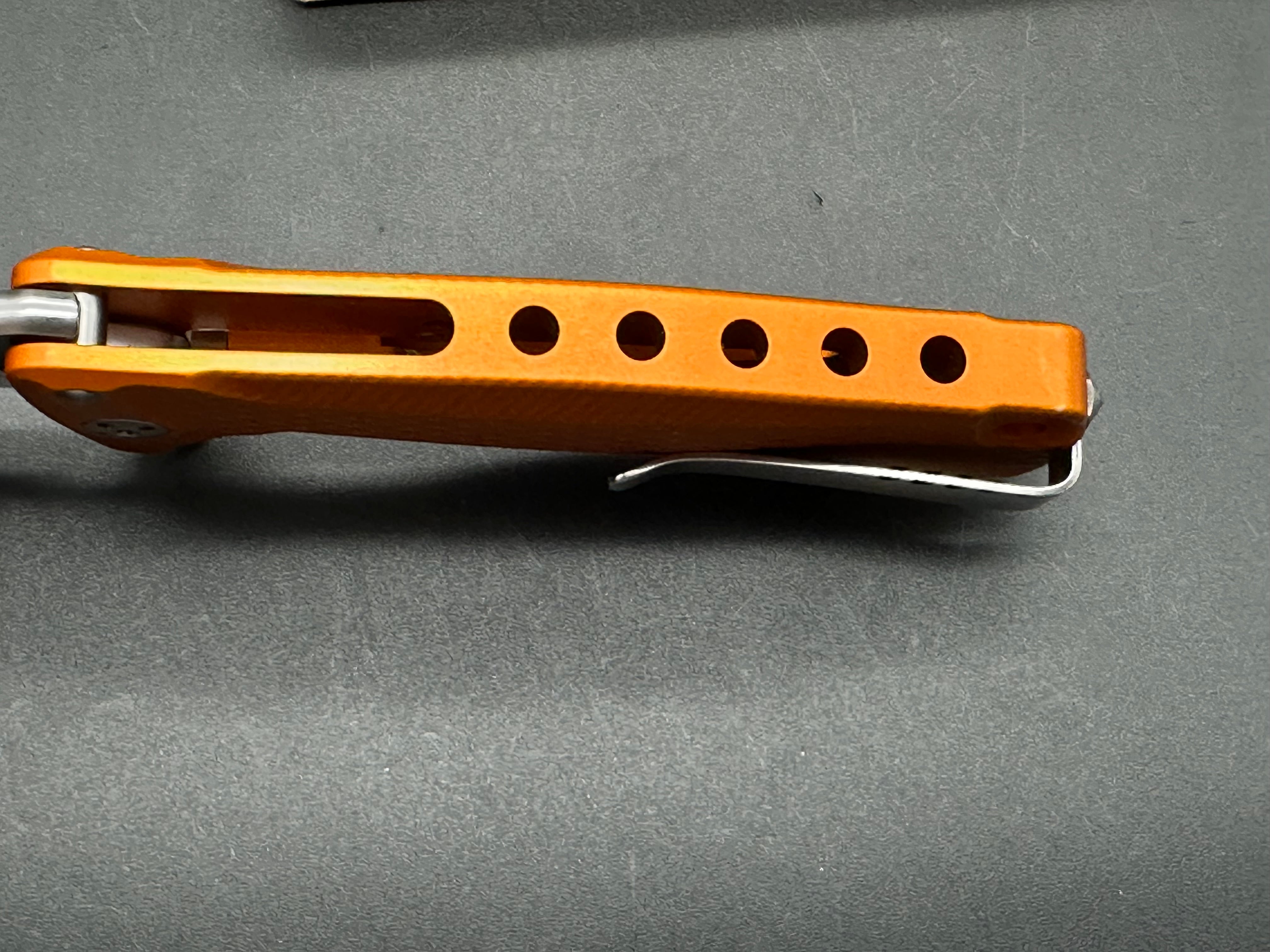 LionSteel SR-22 Flipper Integral Frame Lock Knife Orange Al. (3.125" Satin)