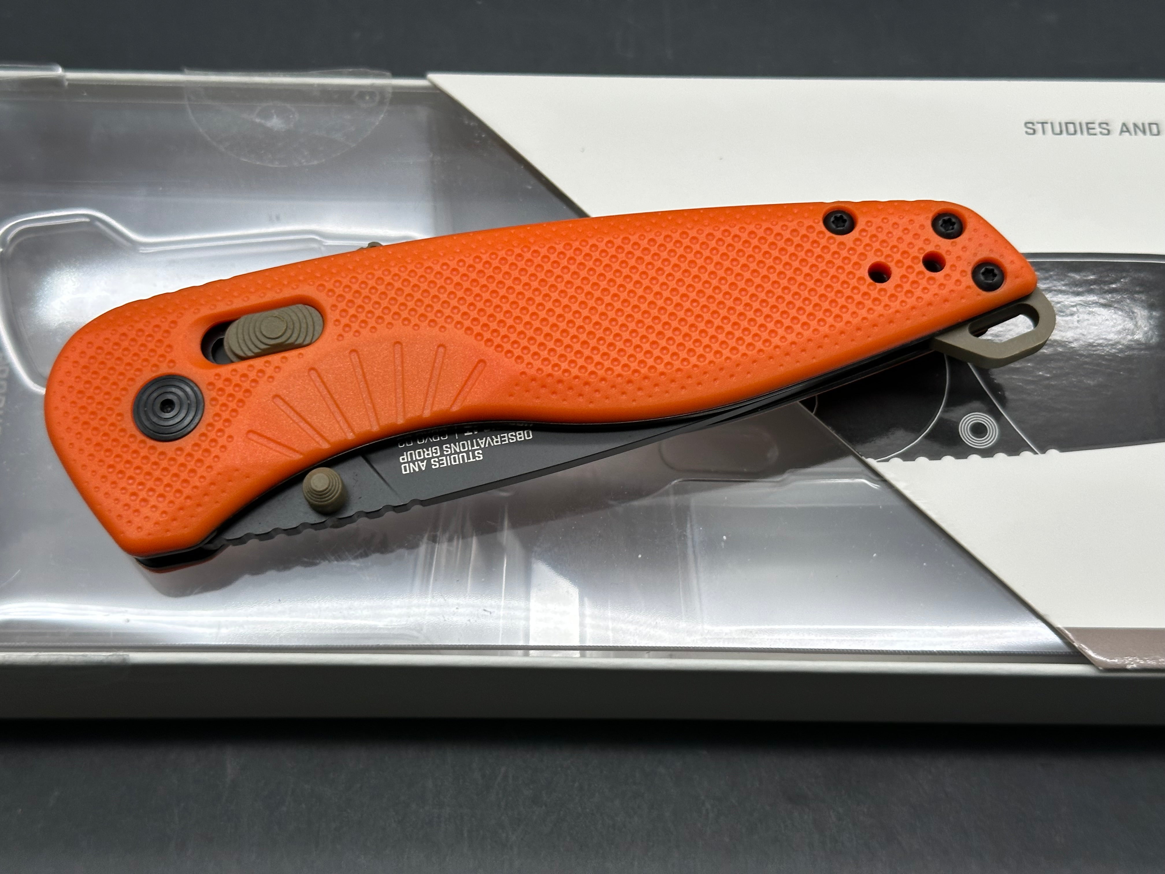 SOG Aegis AT Blaze and Tan Assisted Folding Knife 3.13" D2 Black Plain Blade, Orange GRN Handles