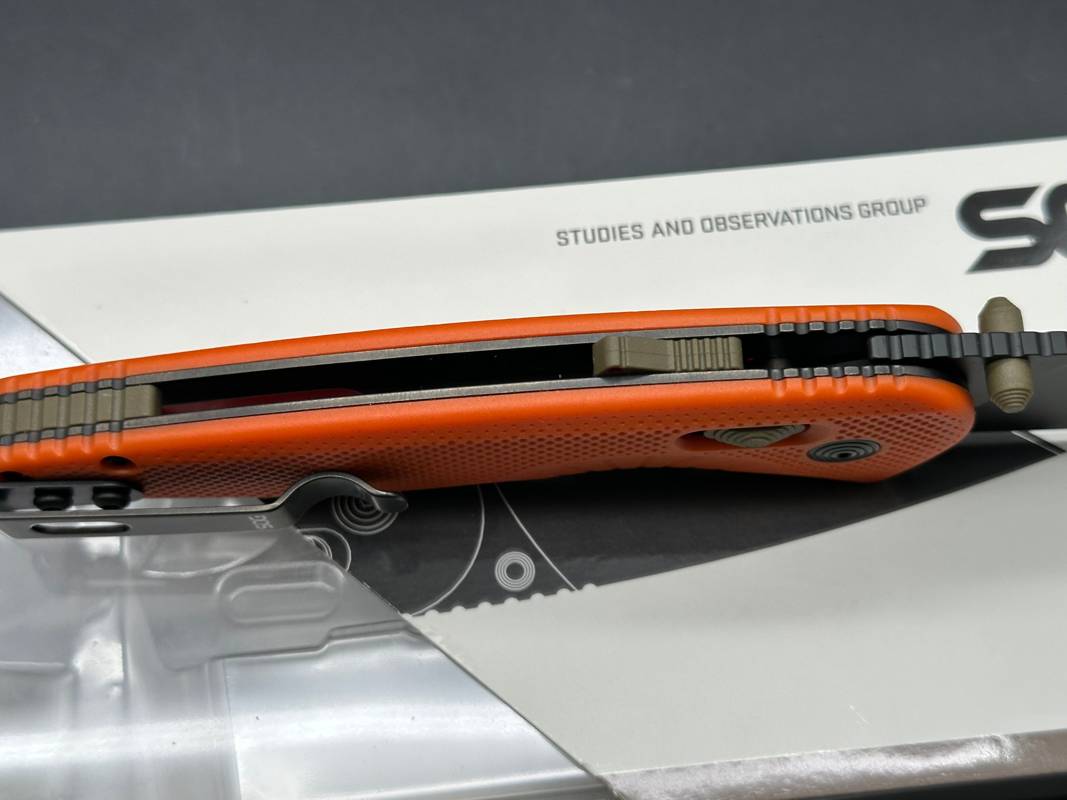 SOG Aegis AT Blaze and Tan Assisted Folding Knife 3.13" D2 Black Plain Blade, Orange GRN Handles