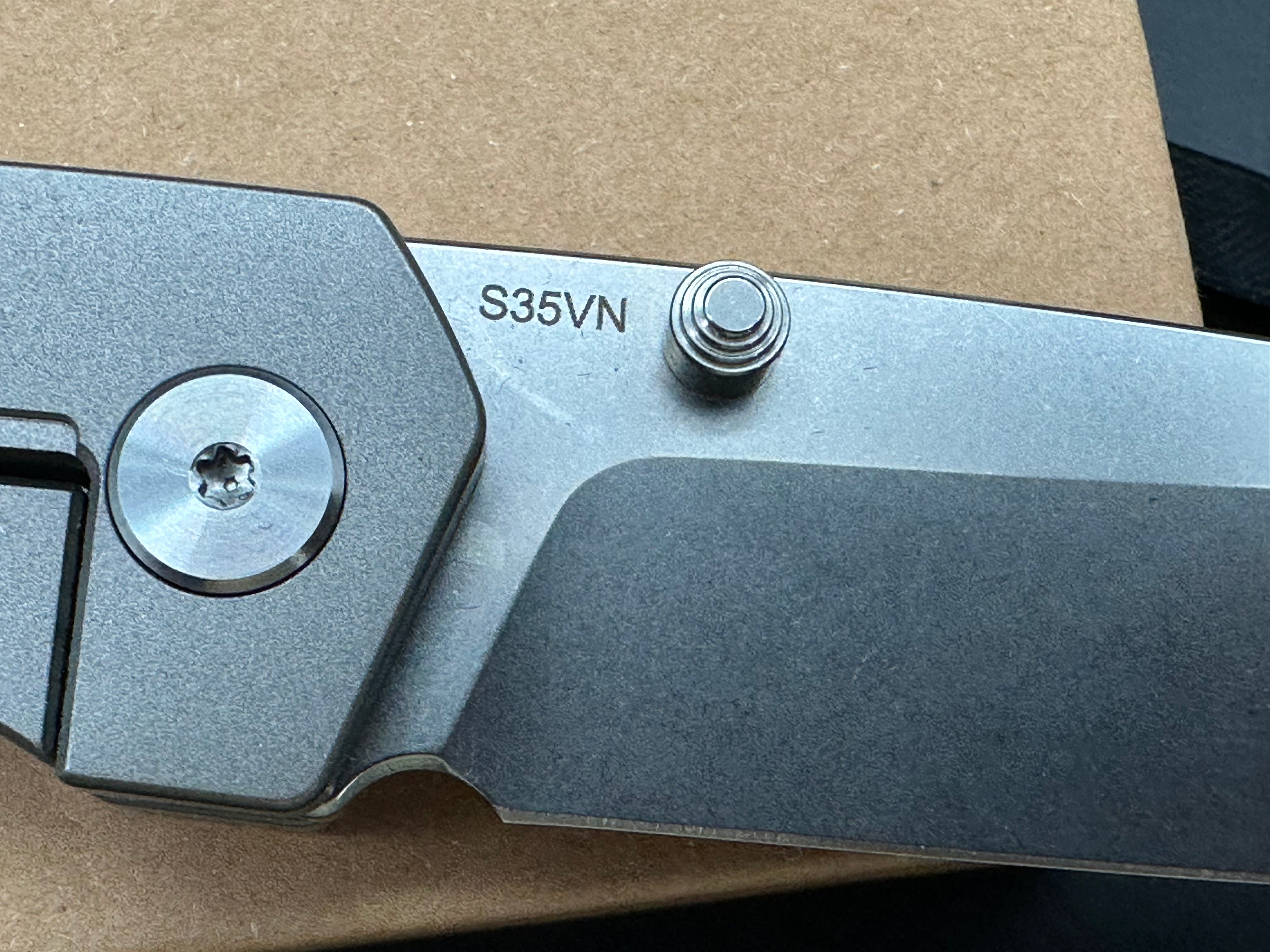 QSP Puffin, Stonewashed S35VN Blade, Blasted Ti Handles w/Carbon Fiber Inlay, Blasted Ti Pocket Clip and Backspacer