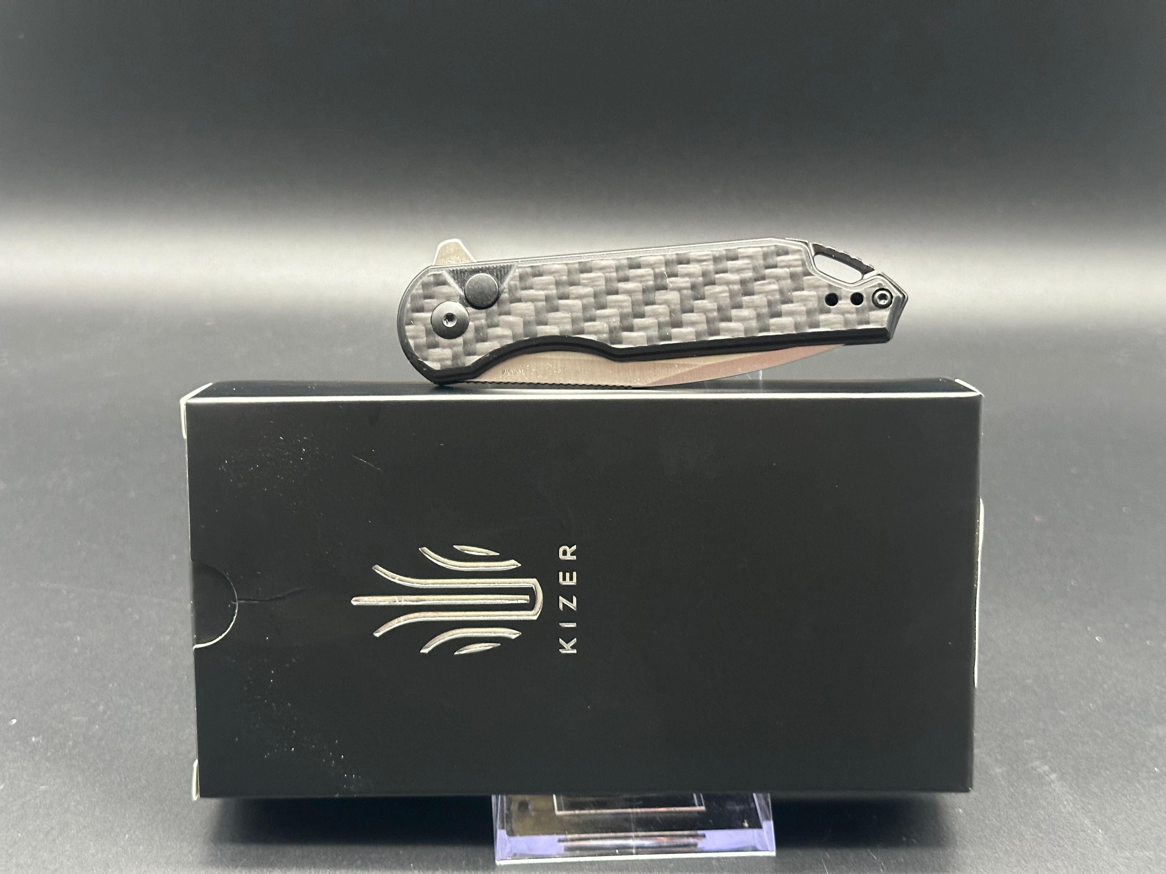 KIZER ASSASSIN BLACK CARBON FIBER/G10 HANDLE 154CM