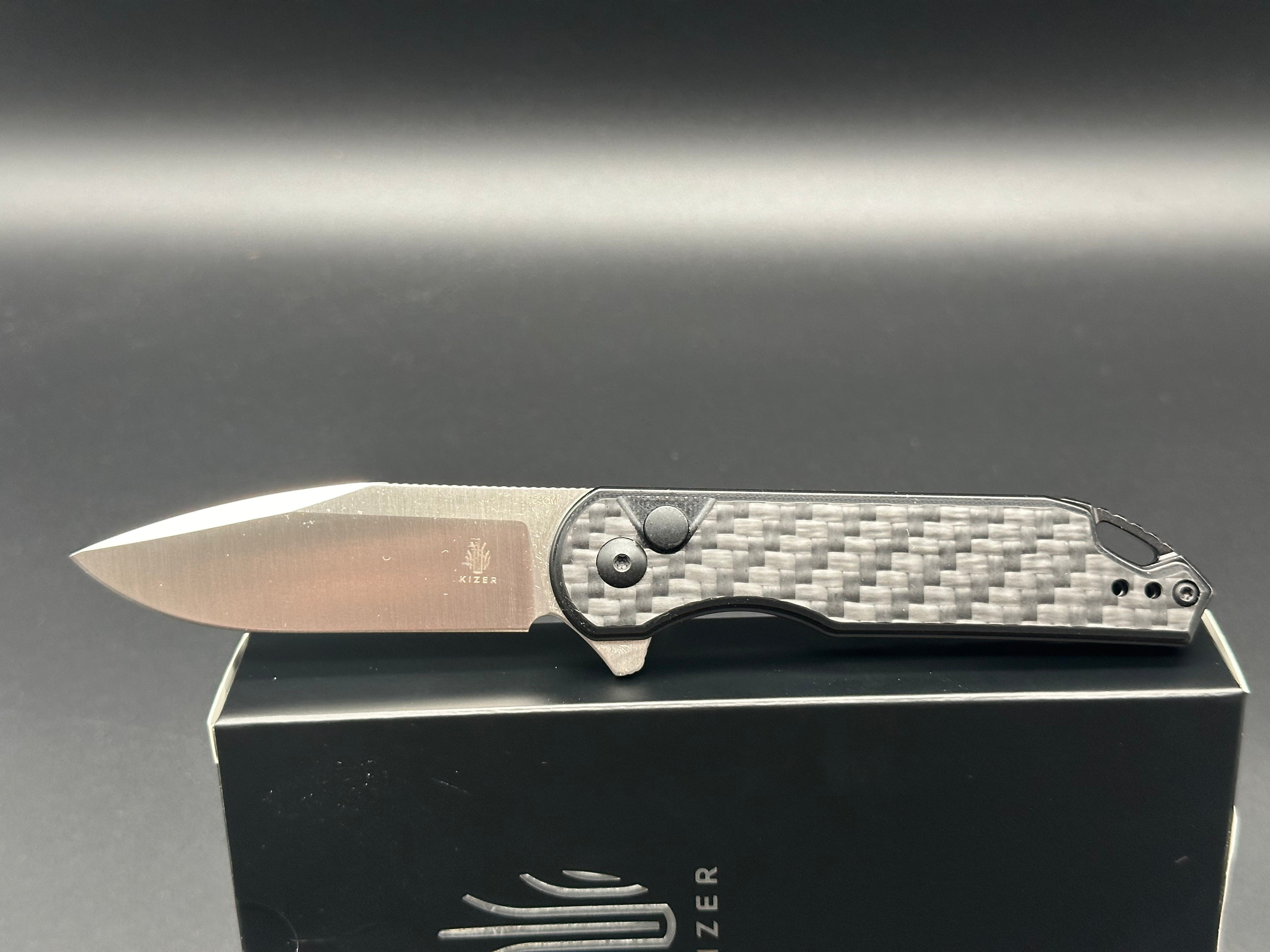 KIZER ASSASSIN BLACK CARBON FIBER/G10 HANDLE 154CM