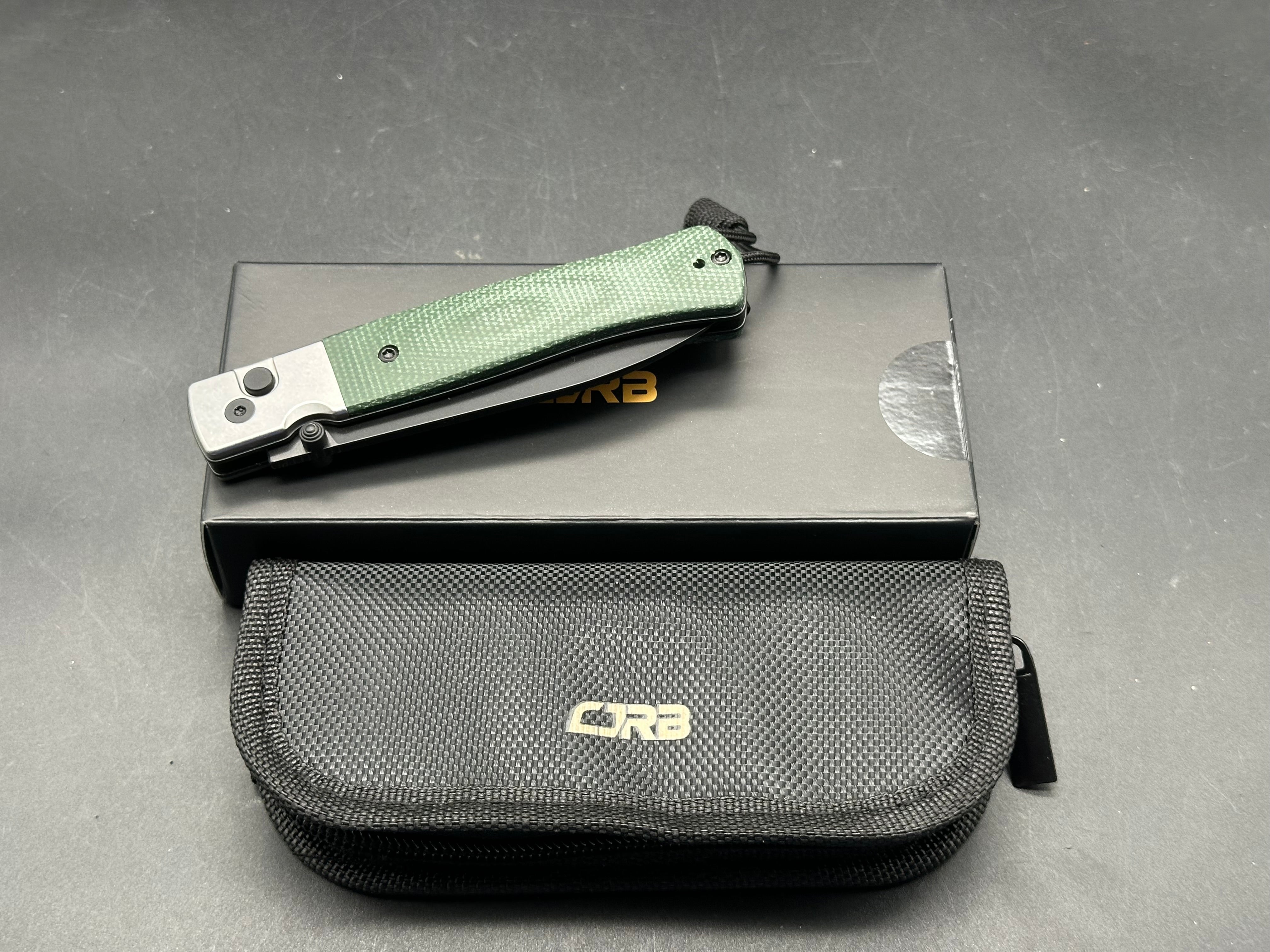 CJRB GLACIER GREEN MICARTA/STEEL HANDLE AR-RPM9 DROP POINT PLAIN EDGE BLACK PVD