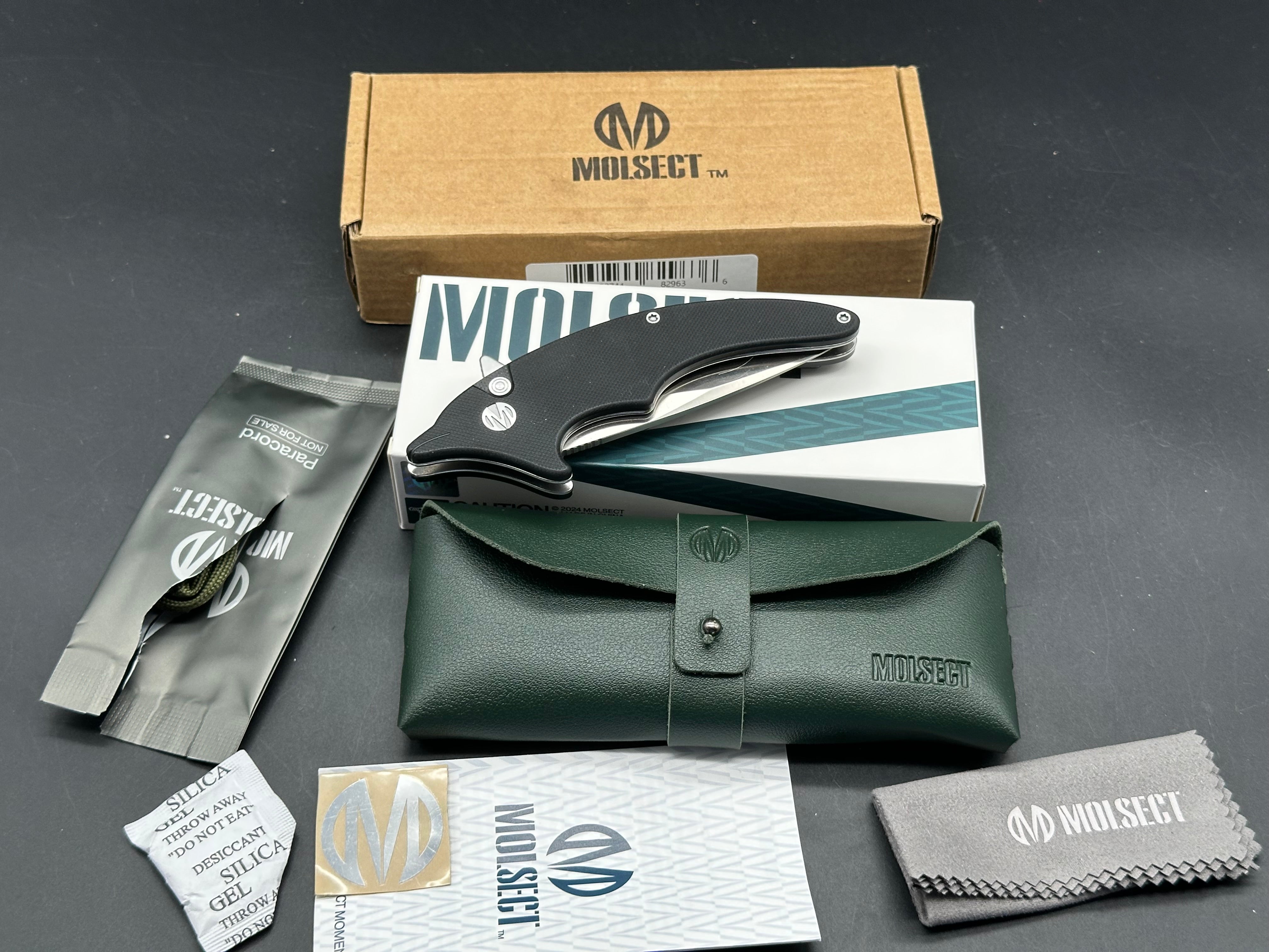 Molsect Cove black G10 handle w/ 14C28N blade