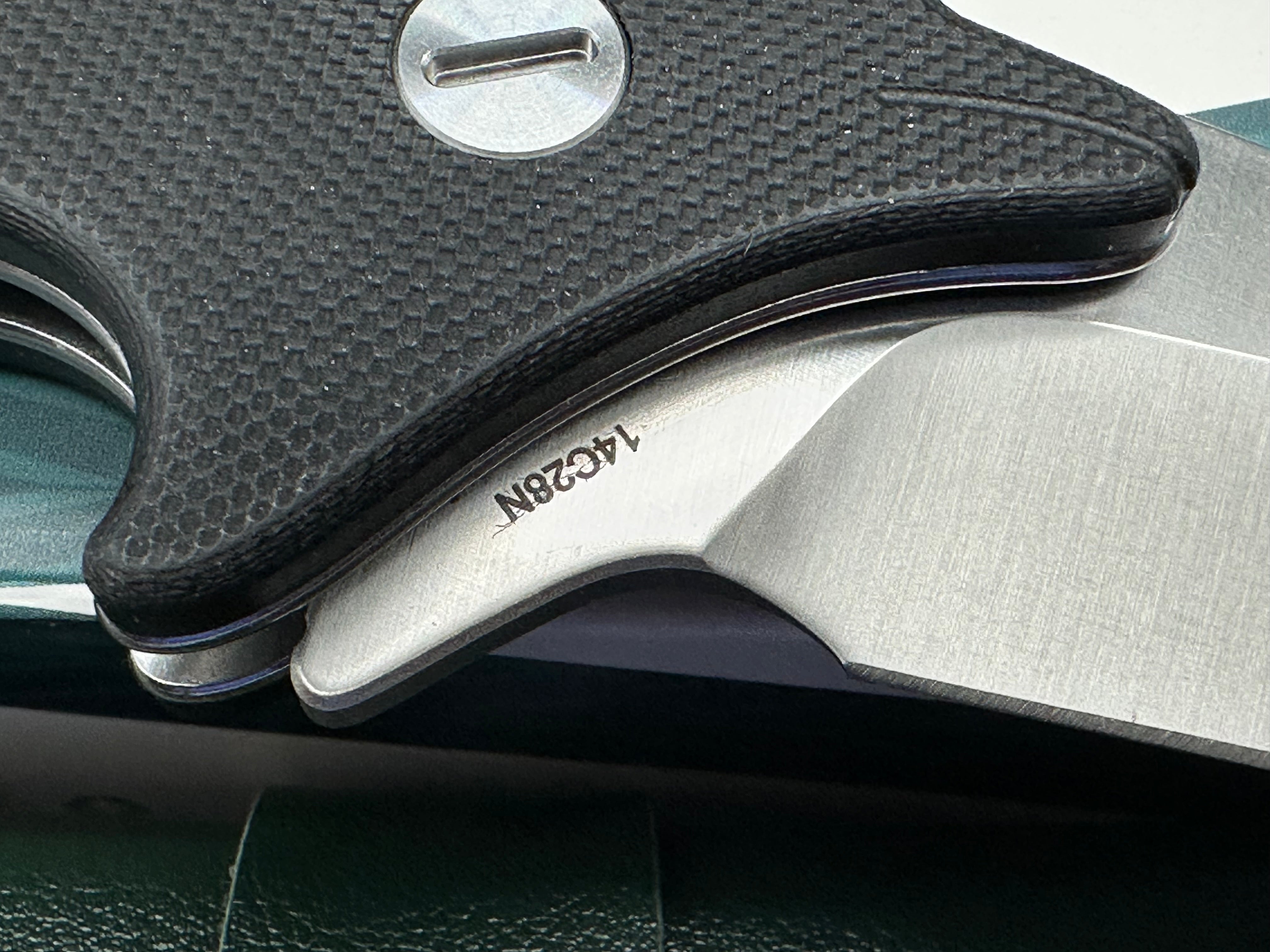 Molsect Cove black G10 handle w/ 14C28N blade