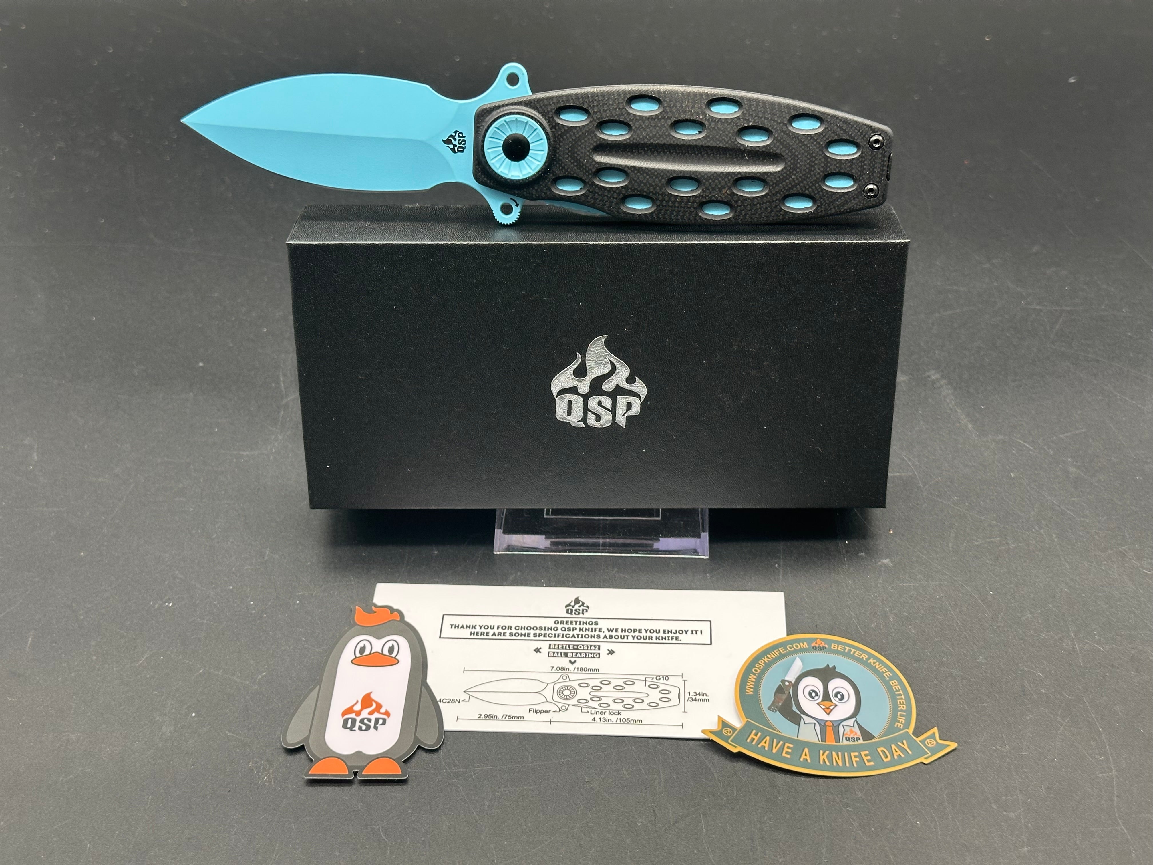 QSP BEETLE BLACK G10/BLUE HANDLE 14C28N PLAIN BLUE BLADE