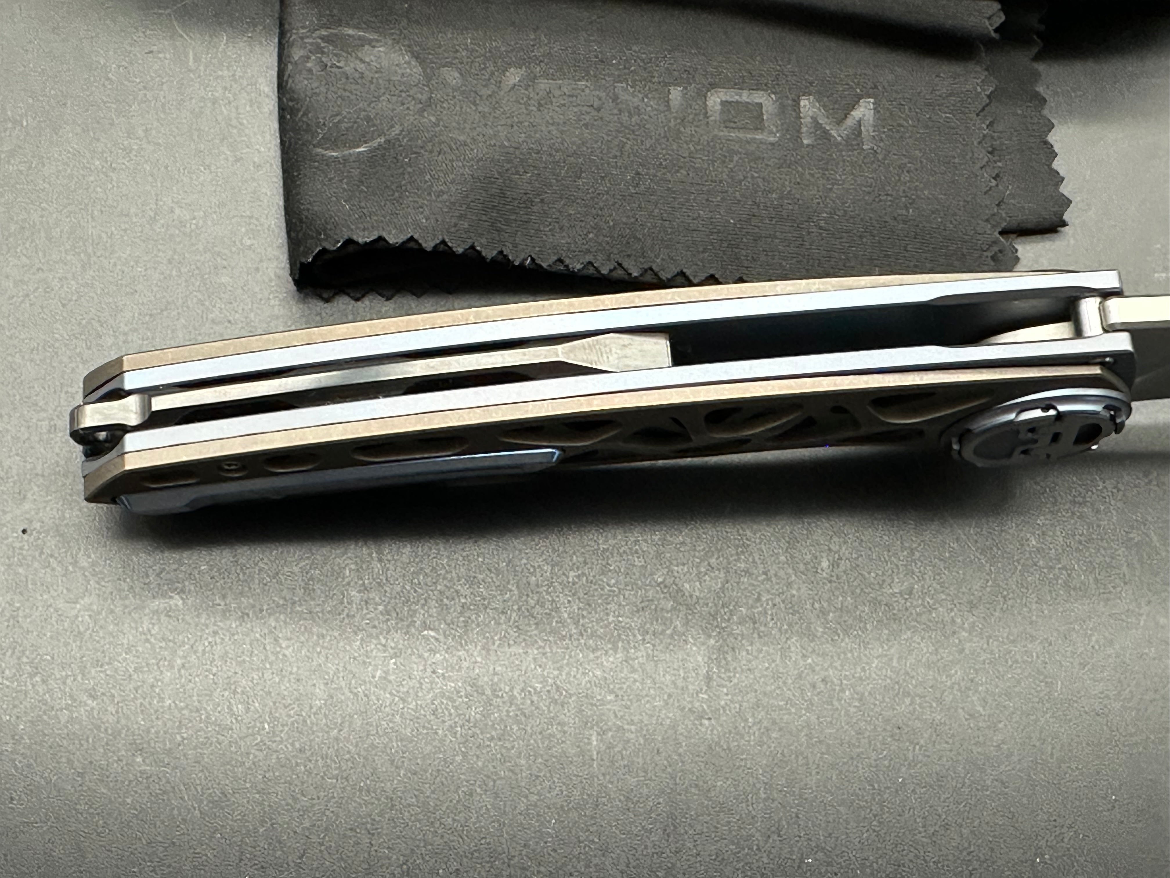 Venom + Kevin John - Armour/Grey Milled Ti Handle + Carbon Fiber Inlays & Gold Hardware/Drop Point/Satin Bohler M390