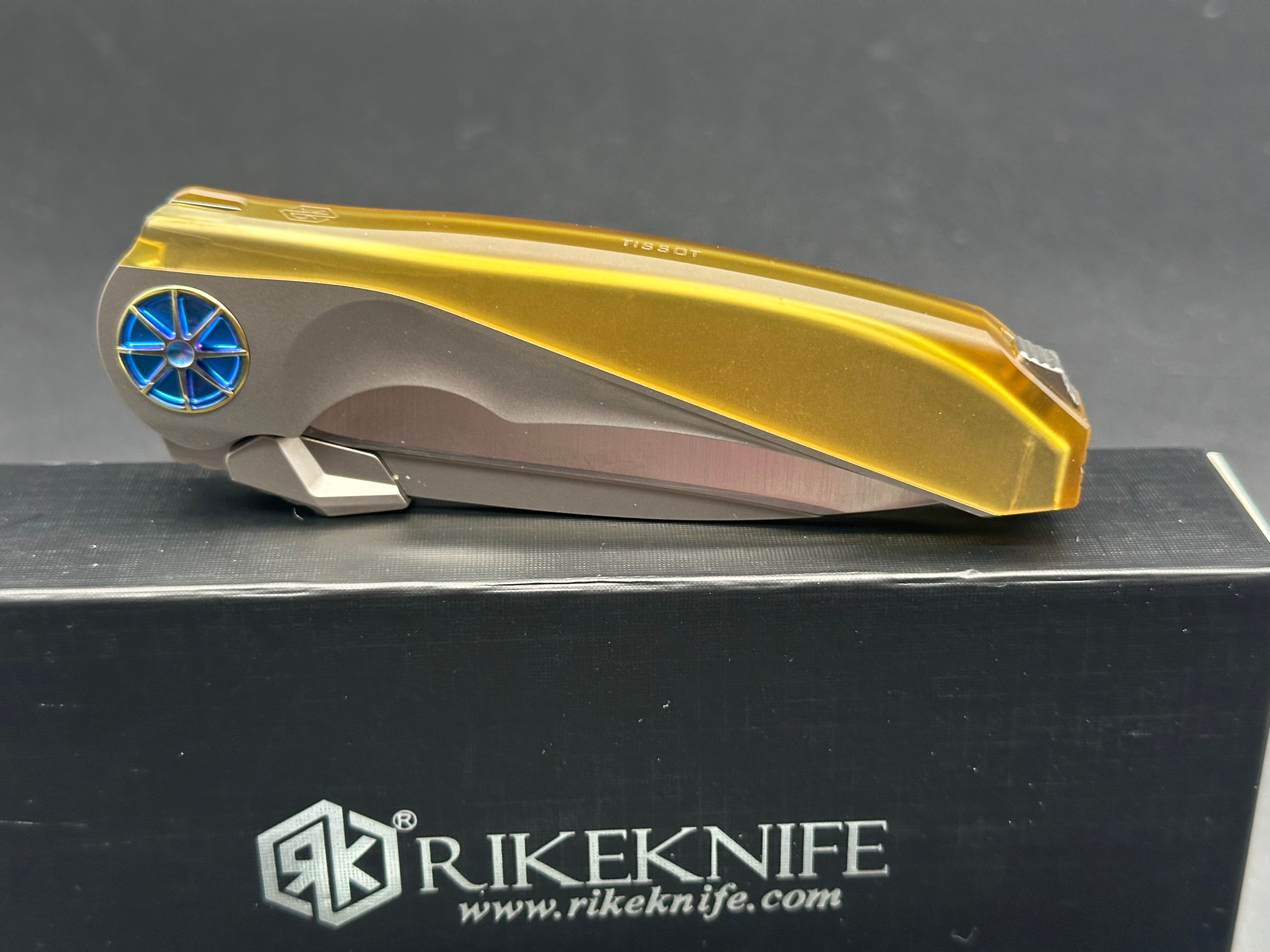 Rike Knife - Tissot V1/Grey Interlocking Integral Overshell Ti Frame + Blue Ano Gear Pivot/Drop Point/Satin M390