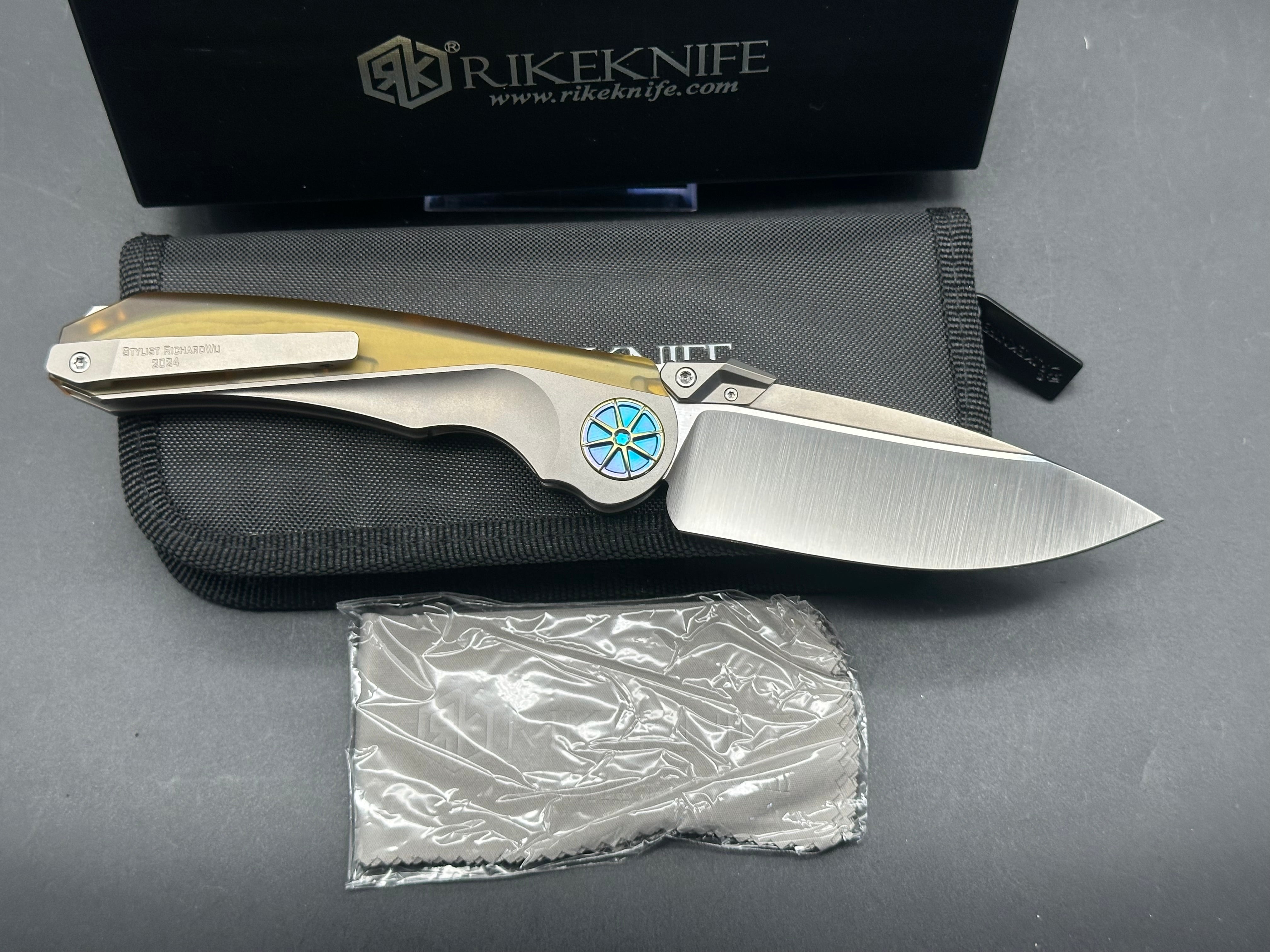 Rike Knife - Tissot V1/Grey Interlocking Integral Overshell Ti Frame + Blue Ano Gear Pivot/Drop Point/Satin M390