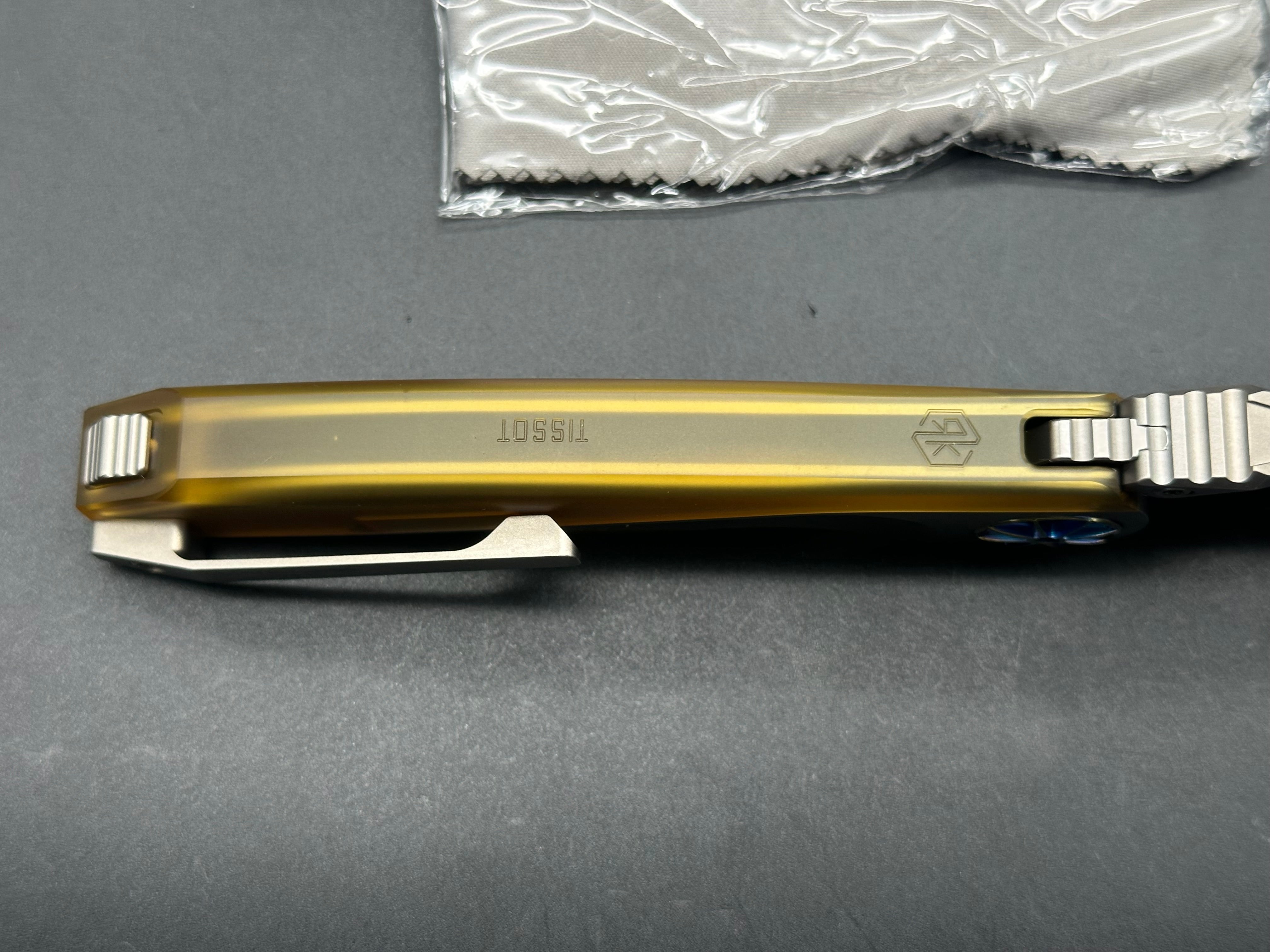 Rike Knife - Tissot V1/Grey Interlocking Integral Overshell Ti Frame + Blue Ano Gear Pivot/Drop Point/Satin M390