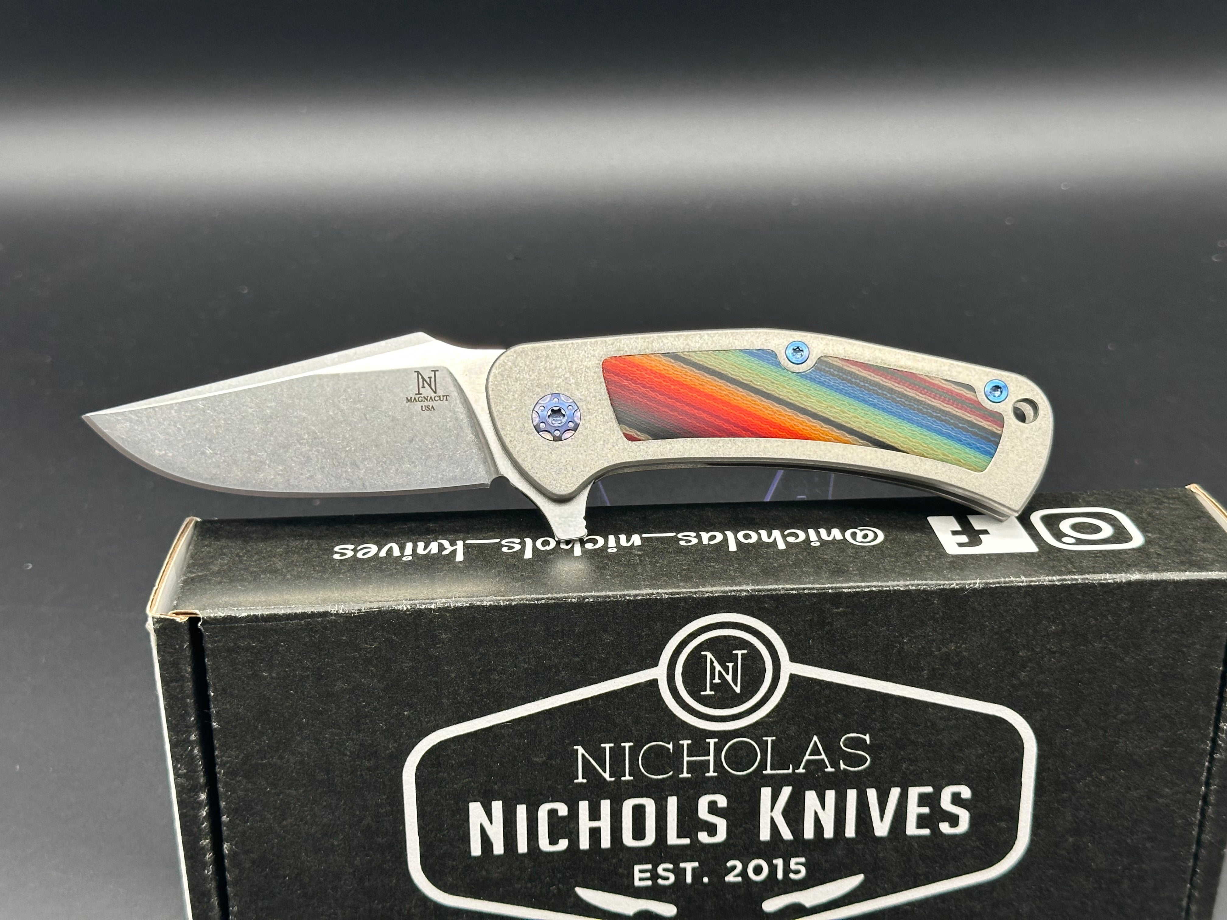 Nicholas Nichols Guppy titanium/mexican blanket micarta handle w/magnacut blade