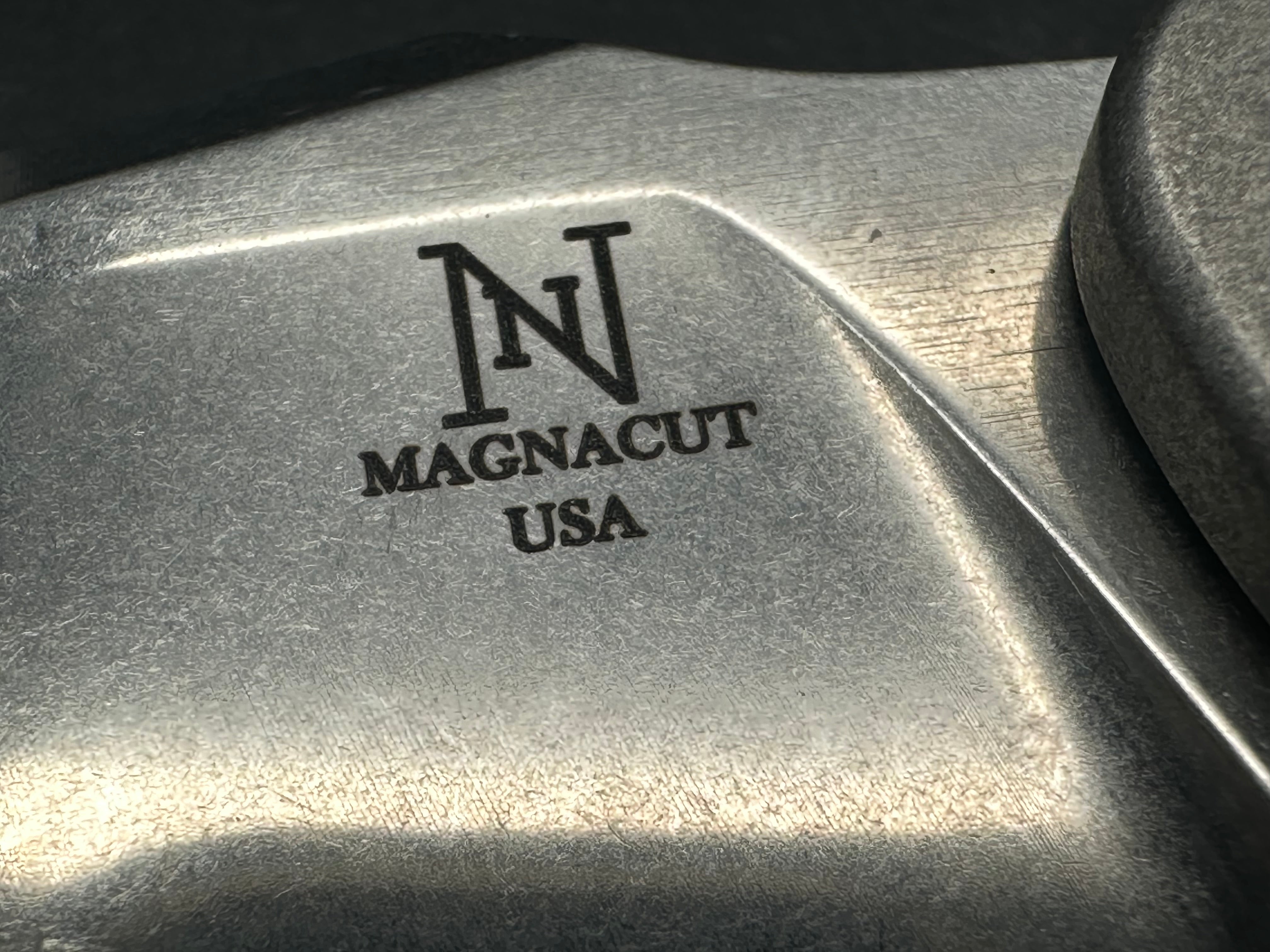 Nicholas Nichols Guppy titanium/mexican blanket micarta handle w/magnacut blade