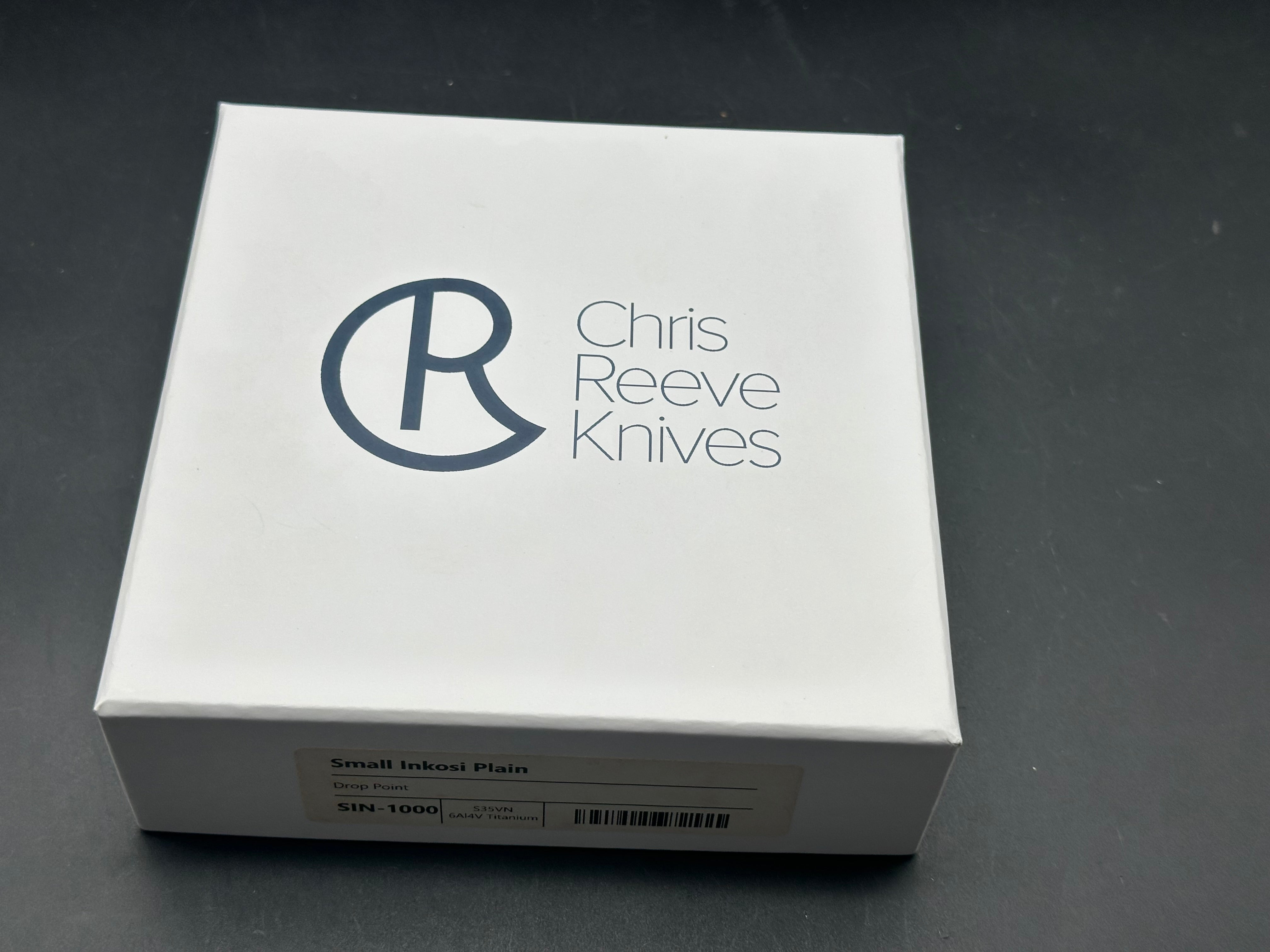 CRK Small Inkosi S35V plain Jane drop point user with snail trails