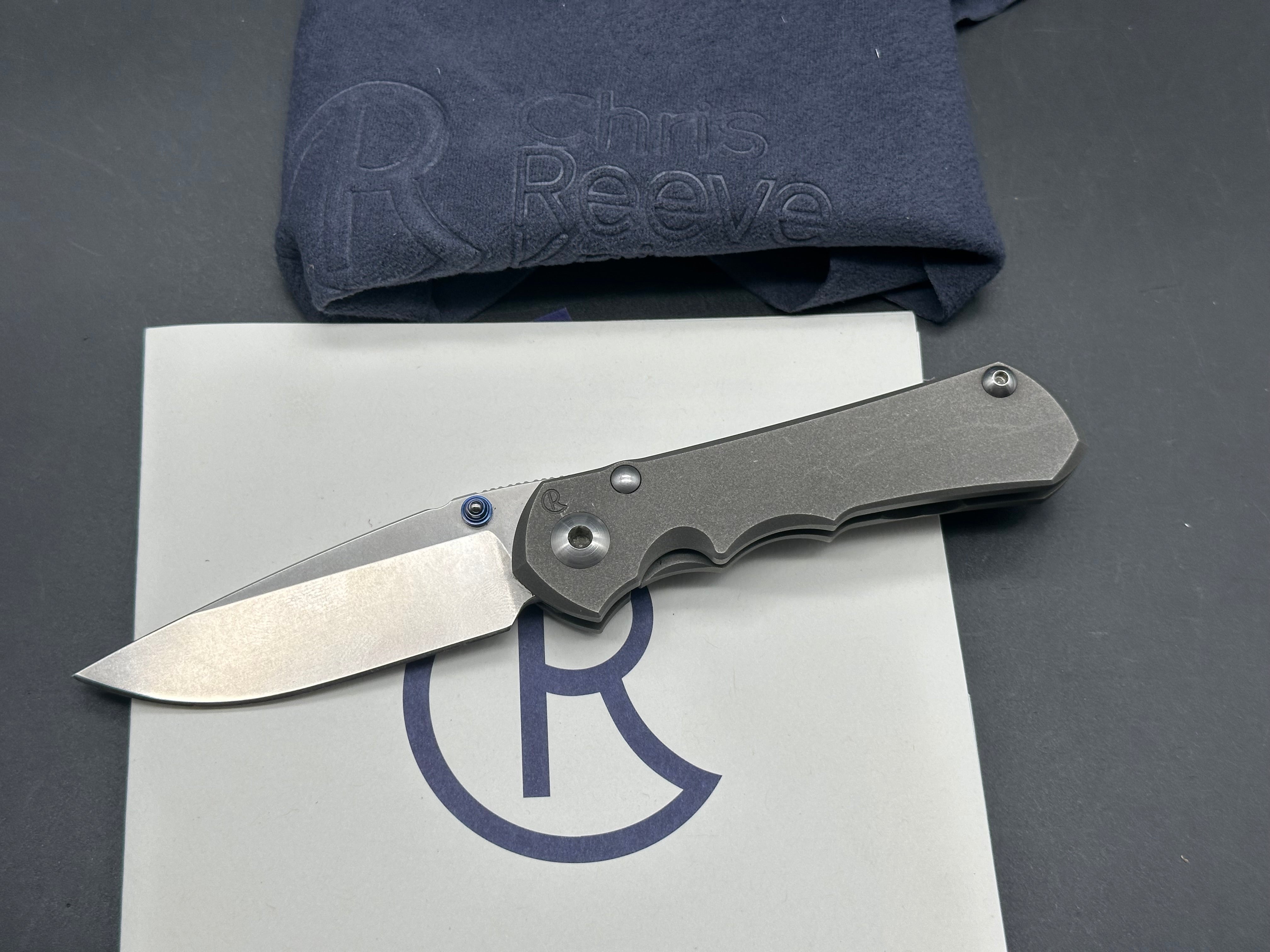 CRK Small Inkosi S35V plain Jane drop point user with snail trails