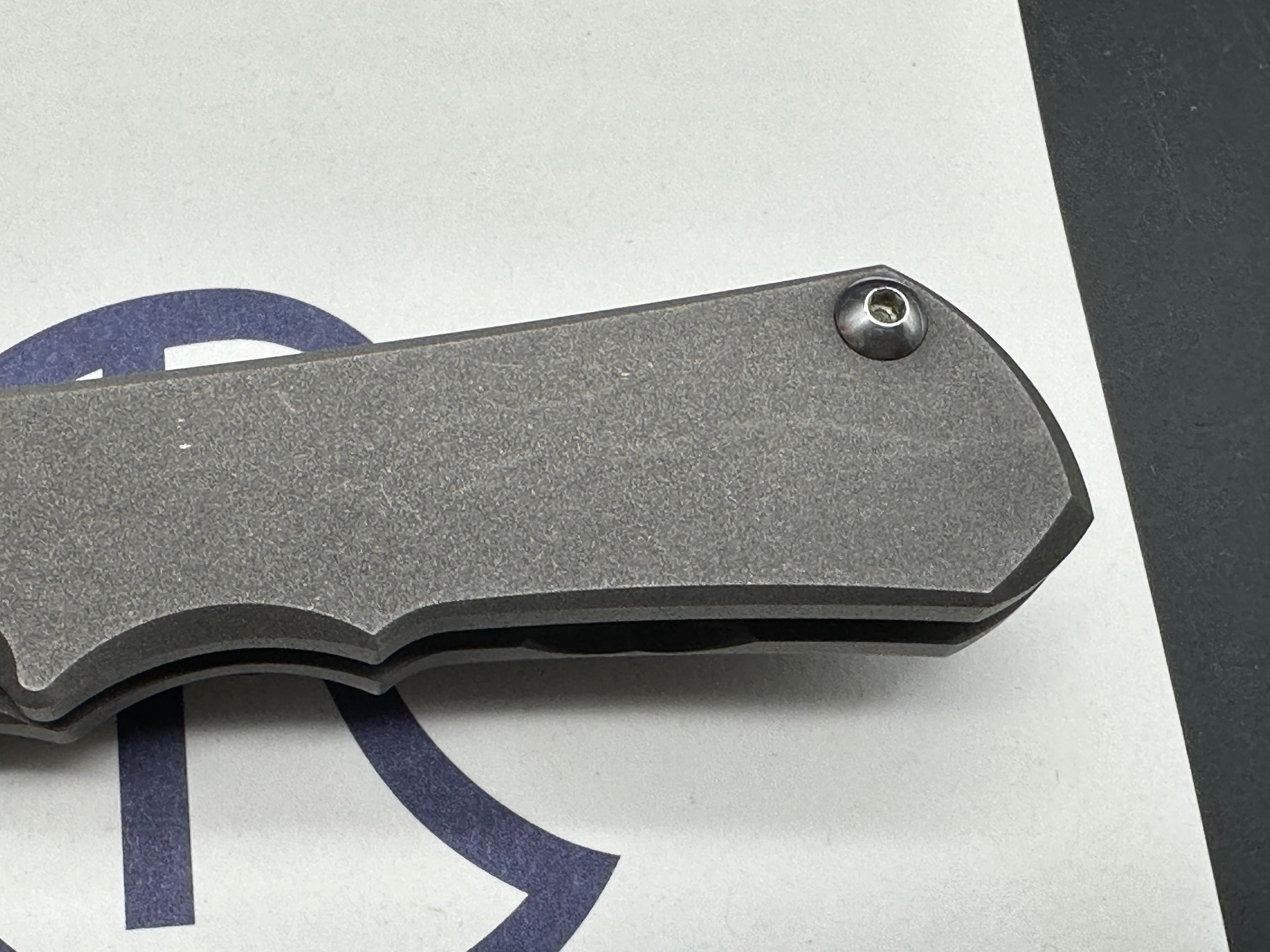 CRK Small Inkosi S35V plain Jane drop point user with snail trails