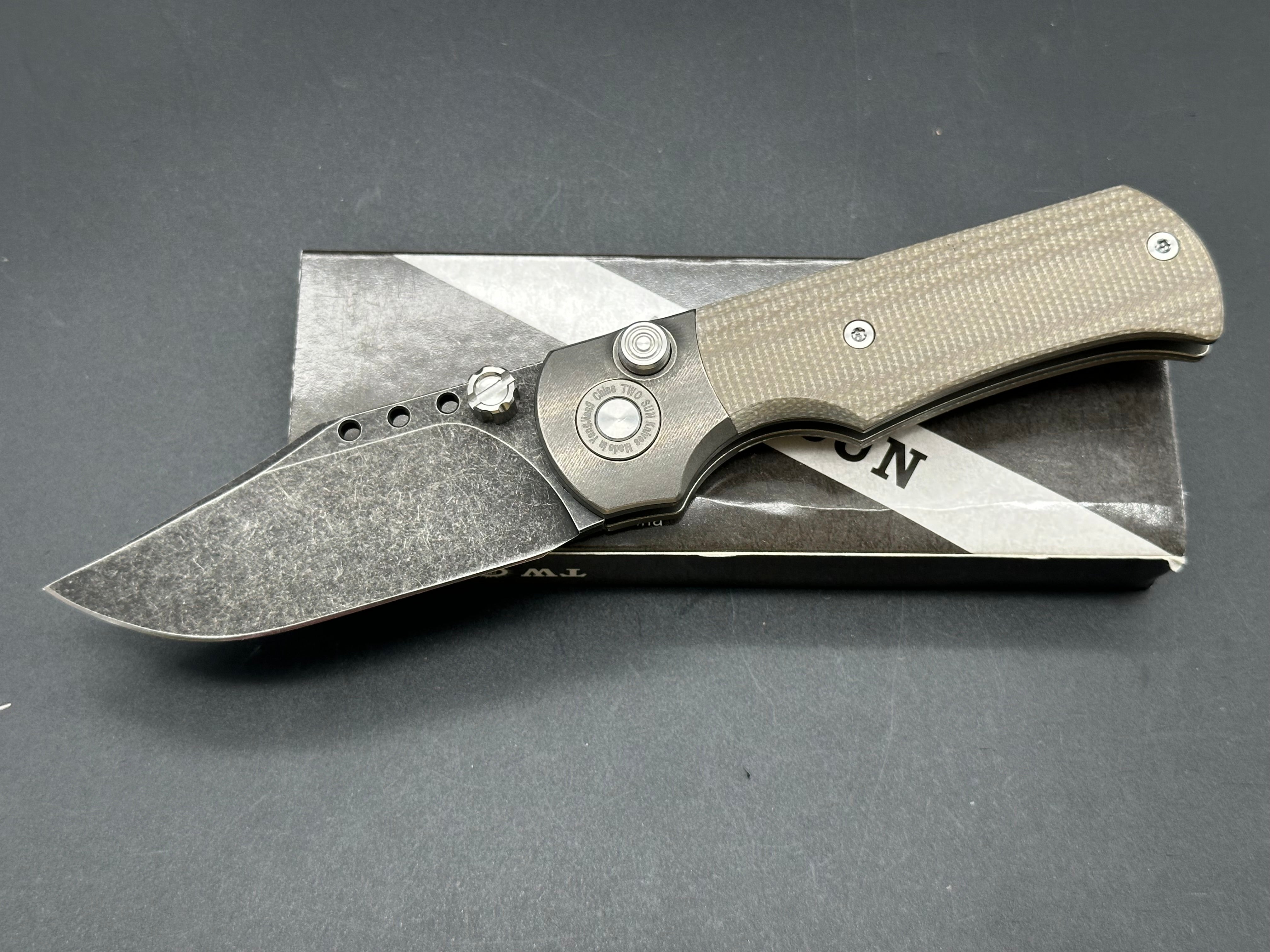 TWOSUN TS338 BUTTON LOCK POCKET KNIFE TAN MICARTA TITANIUM HANDLE D2 PLAIN EDGE