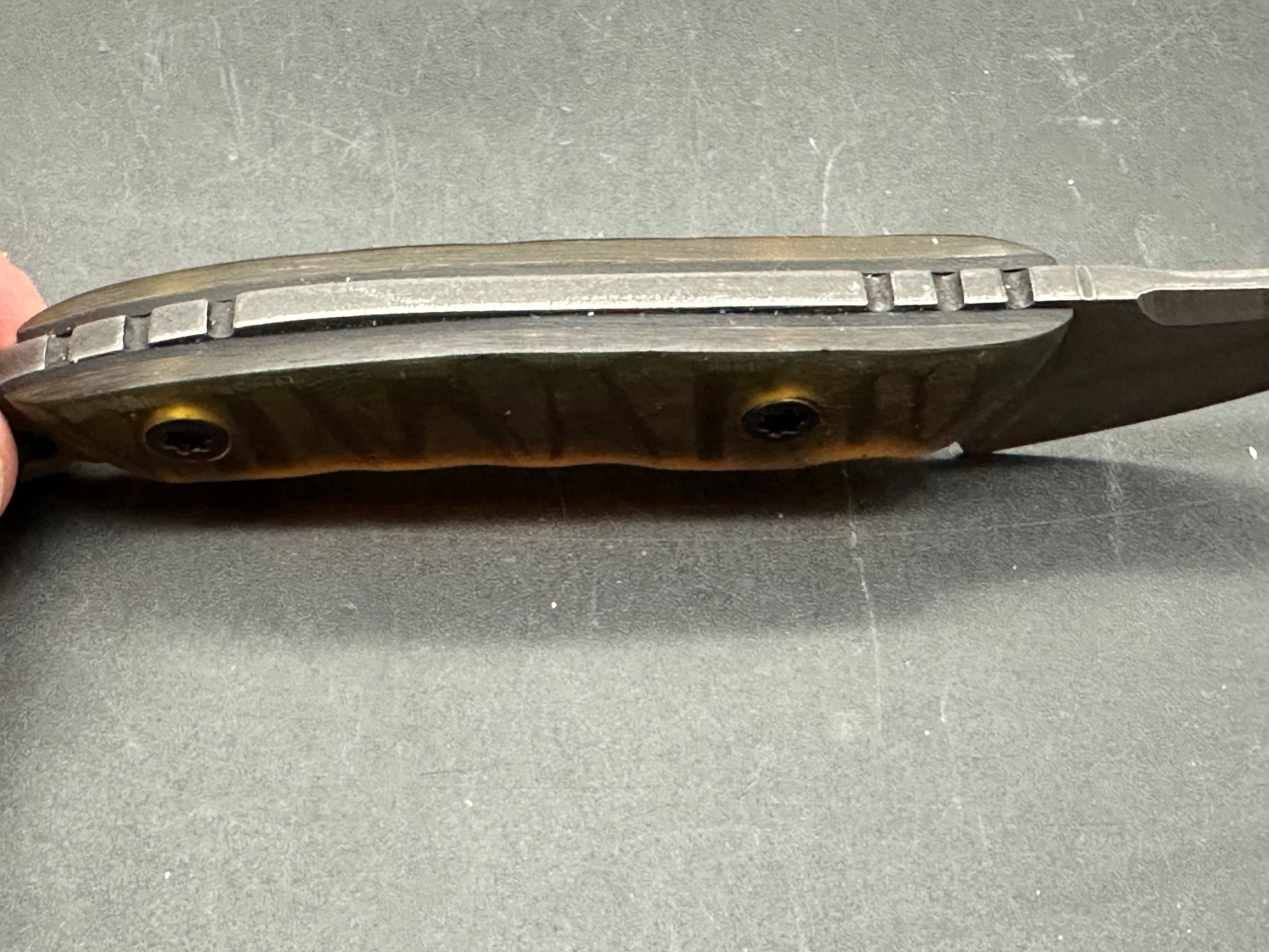 Jason Grant(@brassbrigade) custom/ultem scales with black liners/5 and 3/4 inches overall length