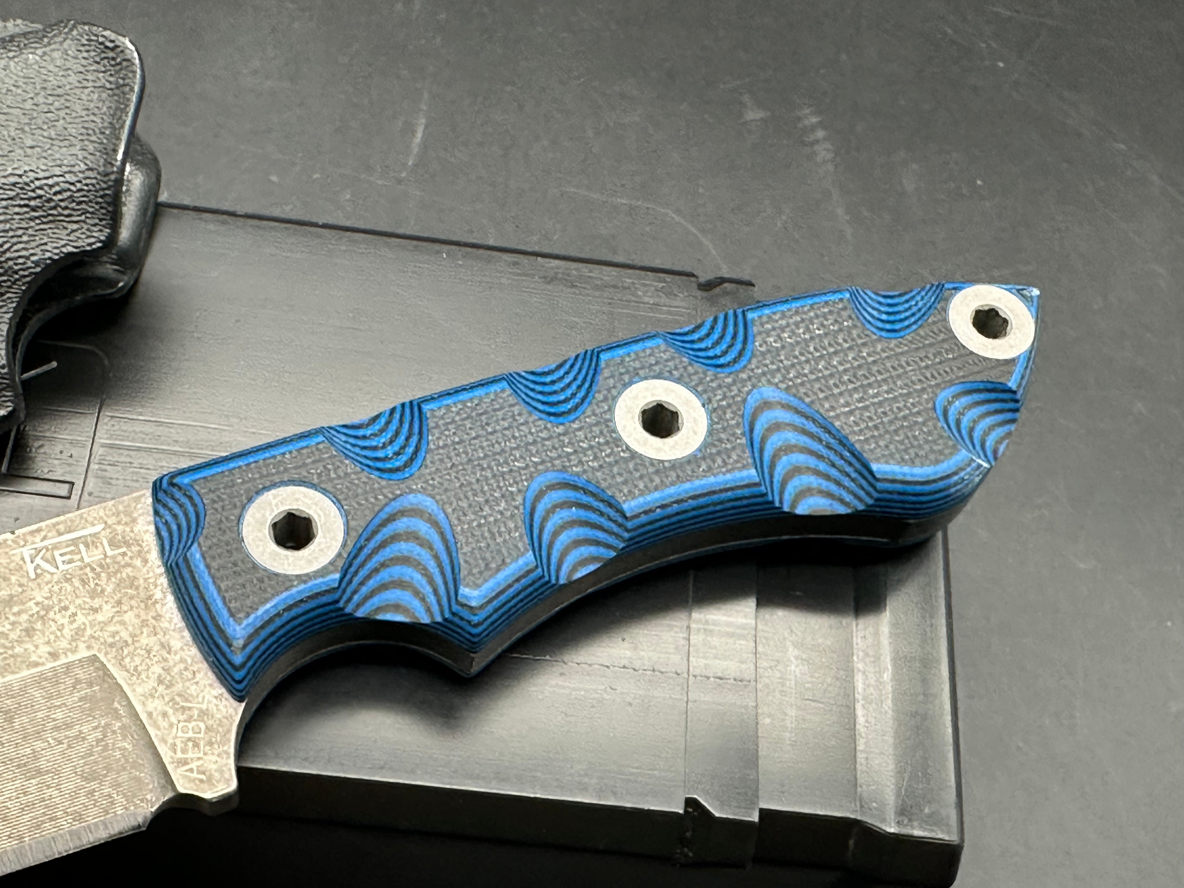 T Kell Raider is AEB-L steel Blue Midnight handle