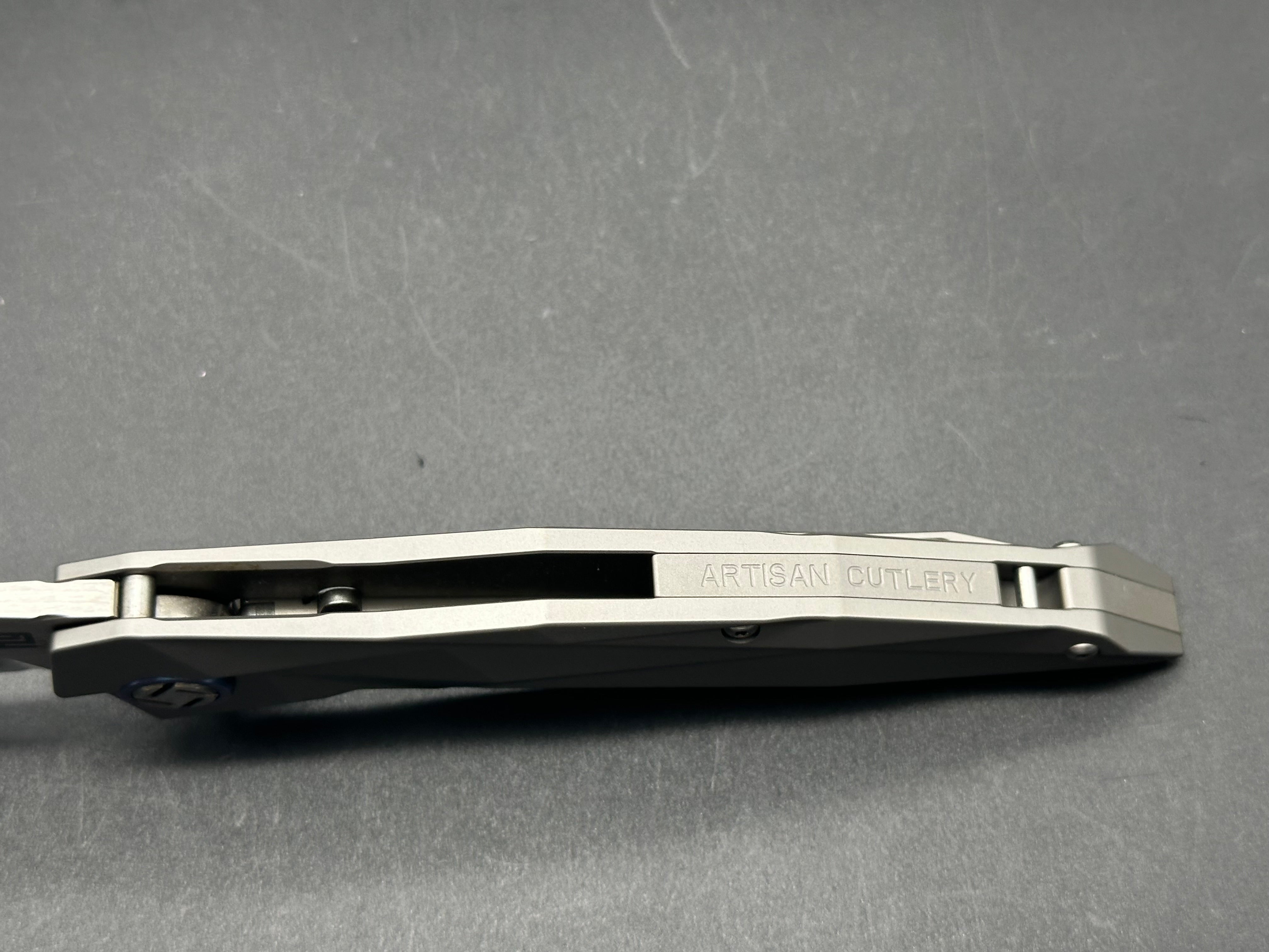 Artisan cutlery Cygnus S35VN Reverse Tanto Blade, Milled TI Handle