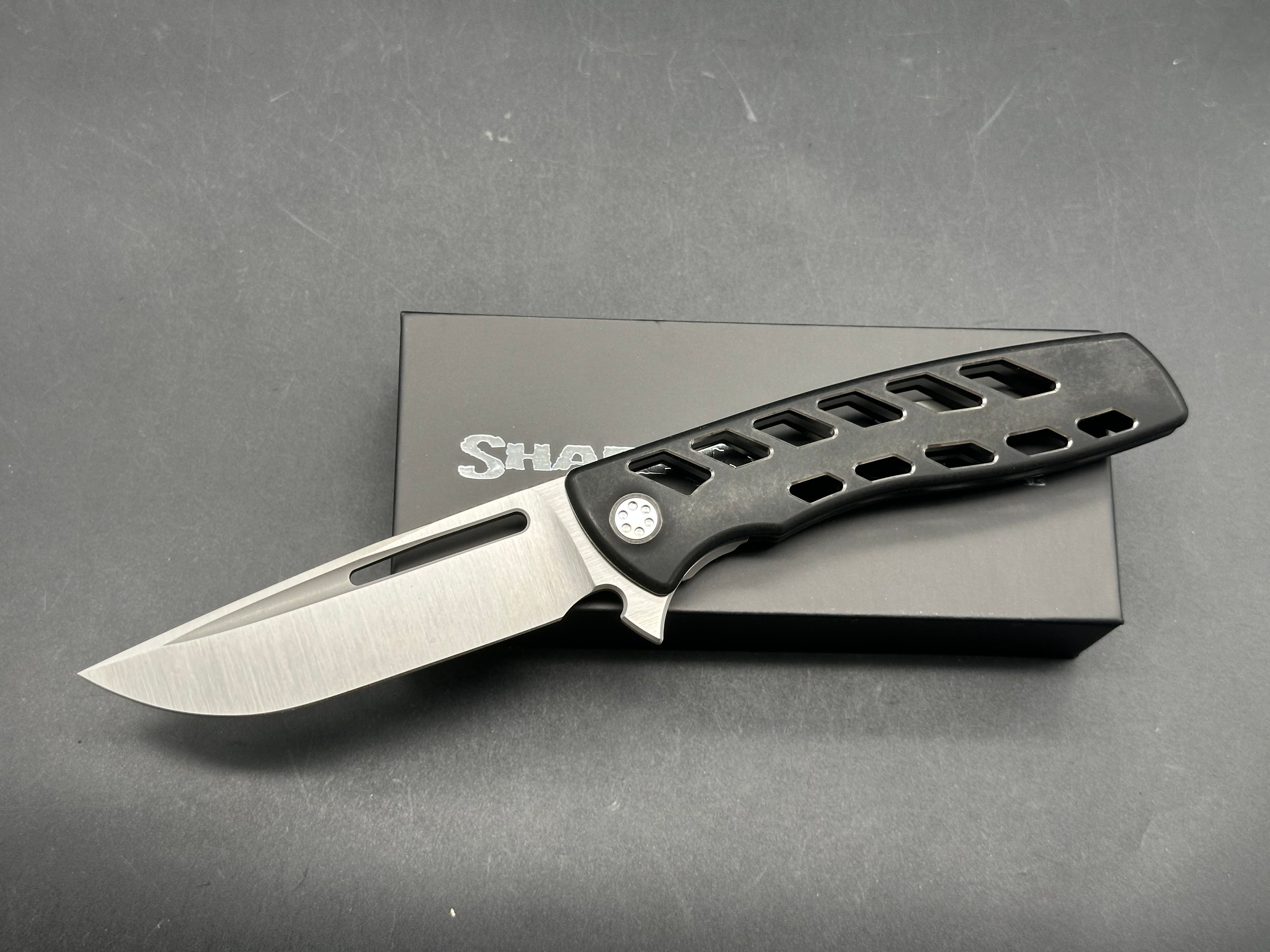 Sharp by Design Evo Typhoon Drop Point Aspirated, Belt Satin M390 Blade, Black PVD Aspirated Ti Handles