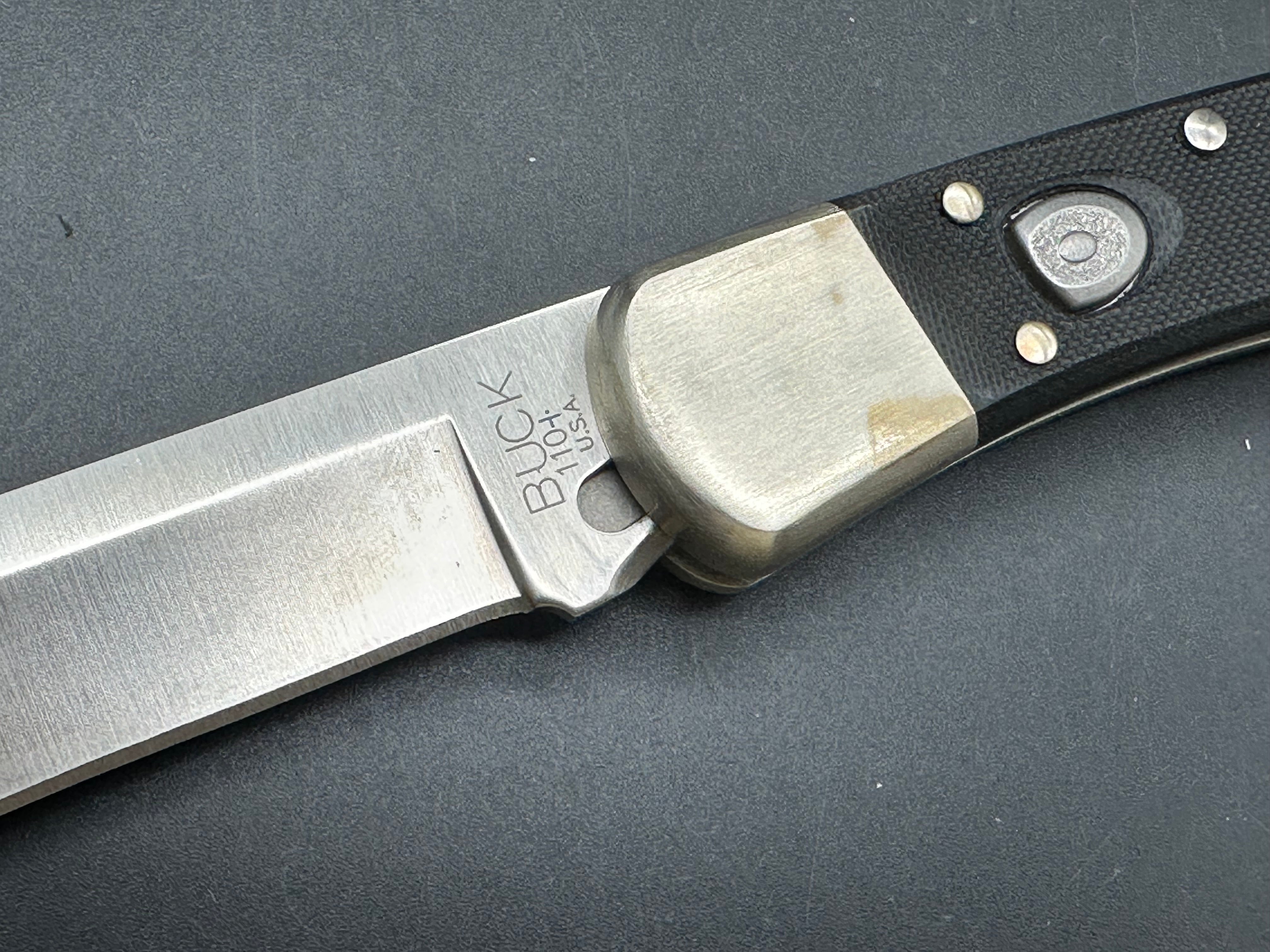 Buck 110 Auto, black G-10 scales, nickel bolsters, with scabbard
