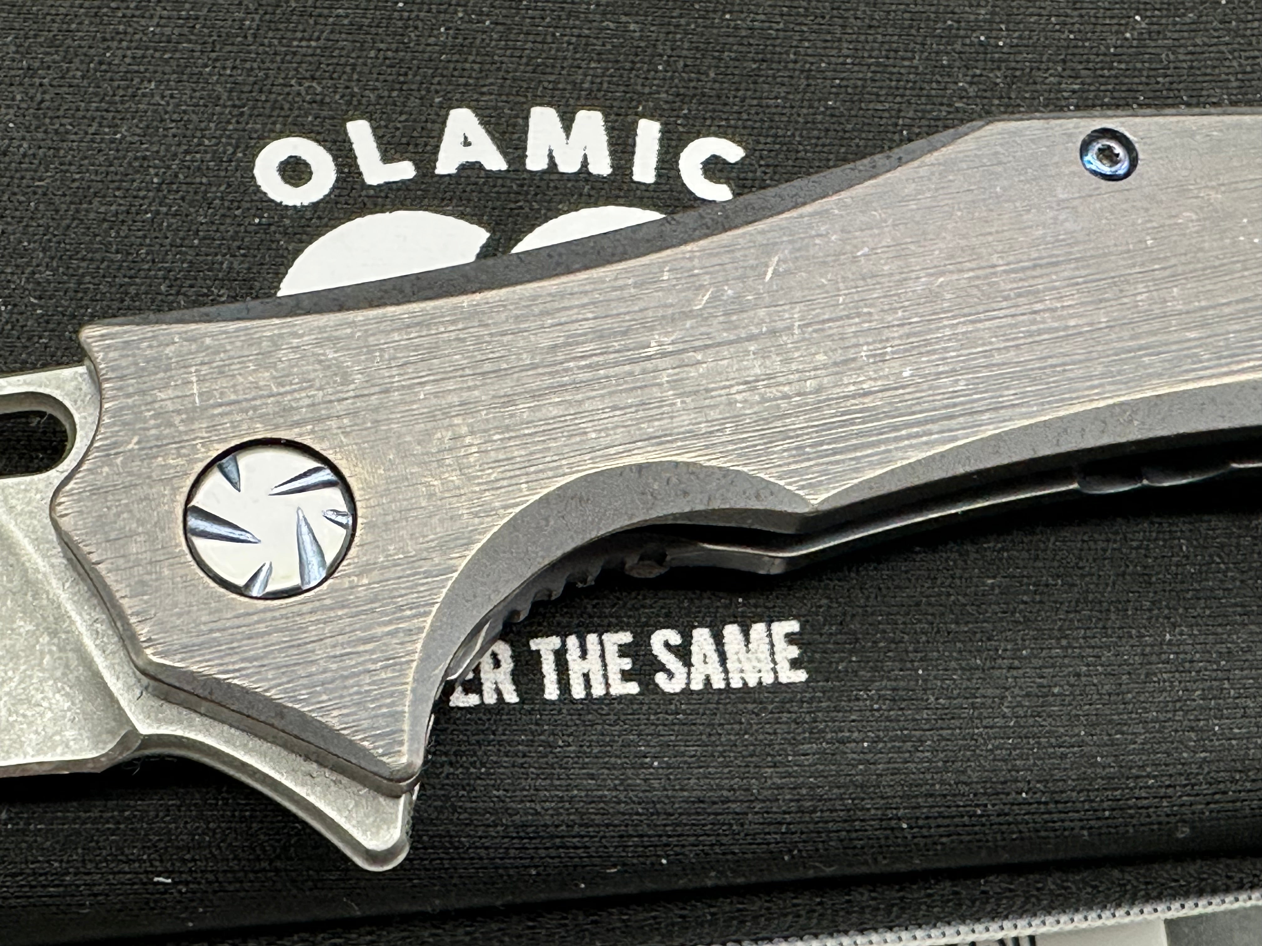 Olamic Swish, Elmax stonewash blade, kinetic sky finish titanium handle