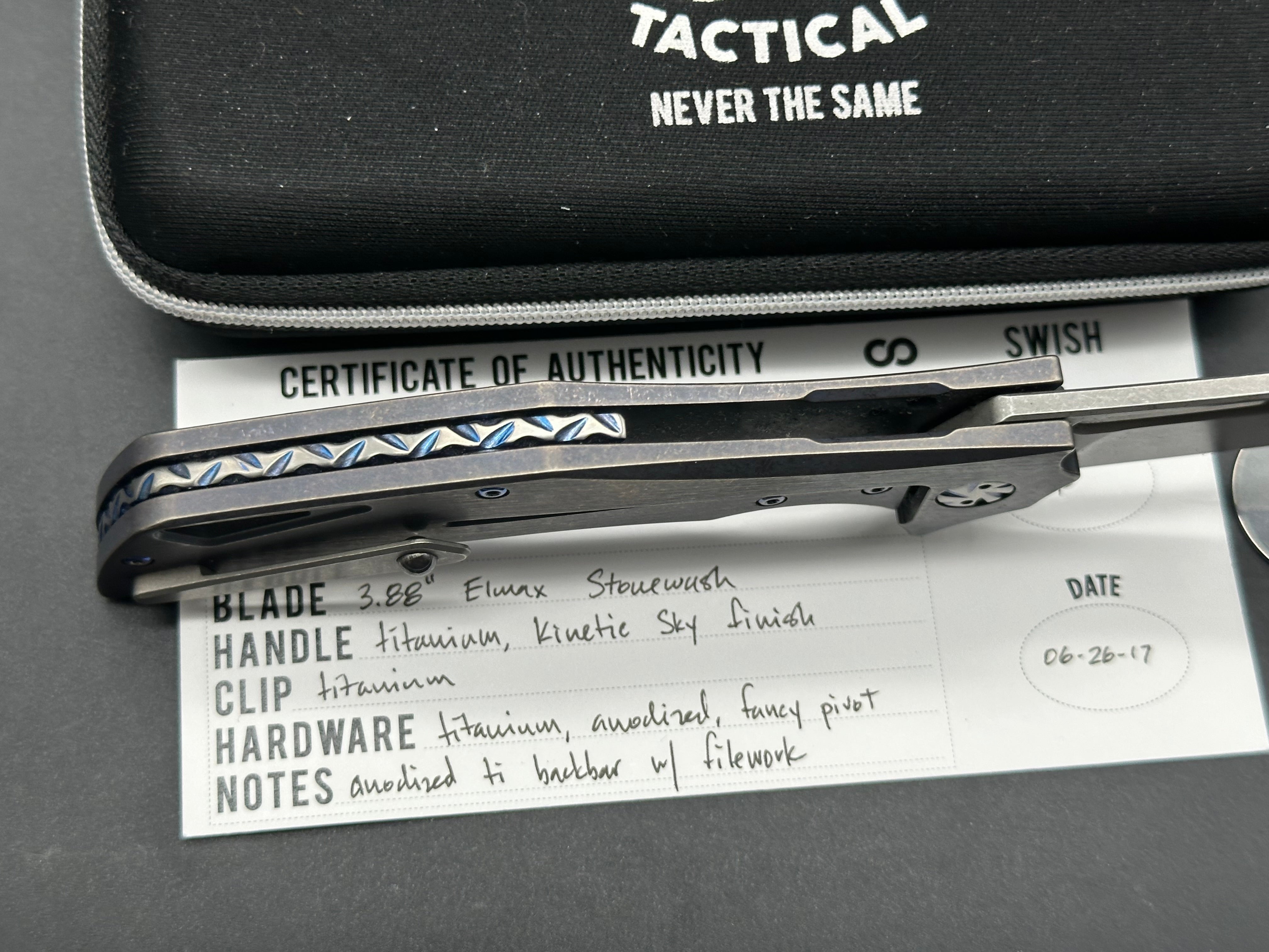 Olamic Swish, Elmax stonewash blade, kinetic sky finish titanium handle