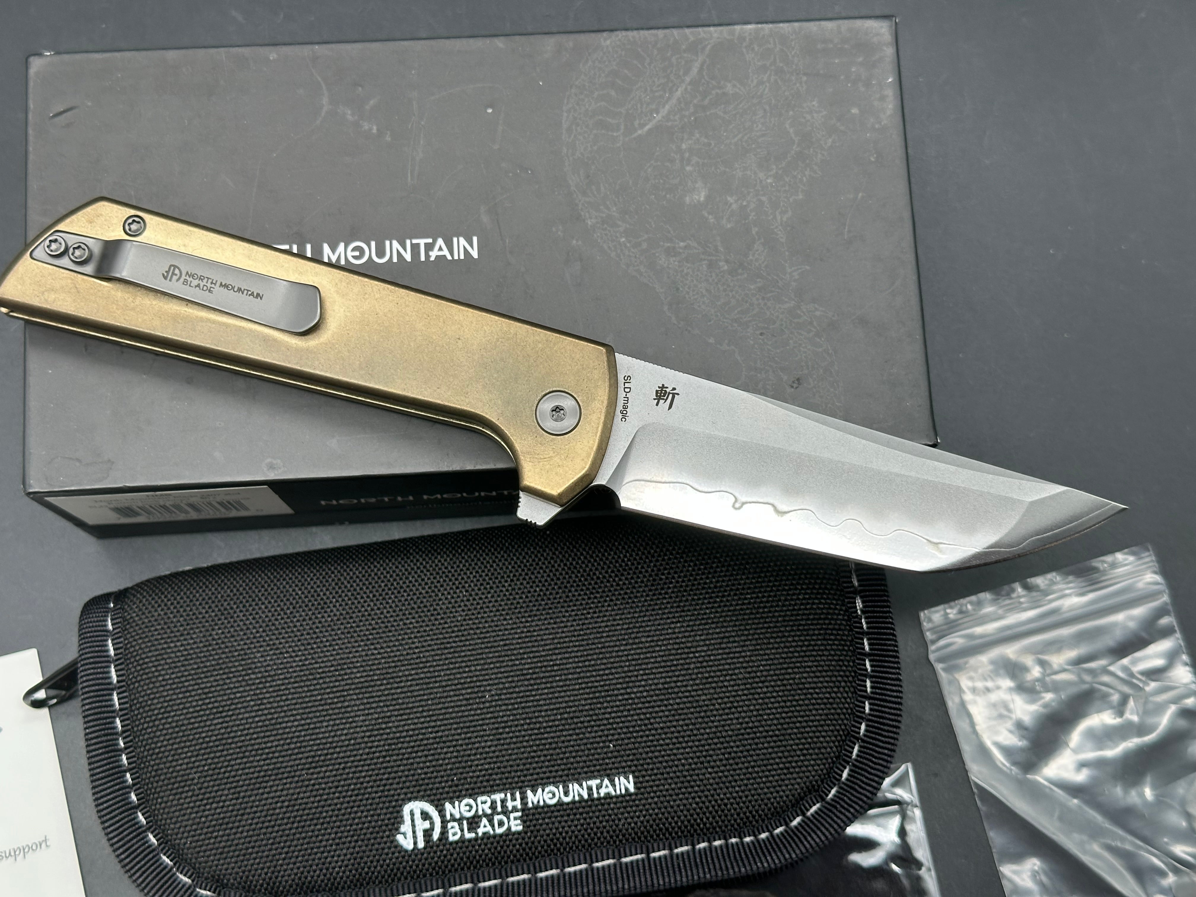 North Mountain Blade Chop 2 Button Lock Flipper Knife 3.5" SLD Hamon Drop Point Blade, Aluminum Bronze Handles with Speed Holes