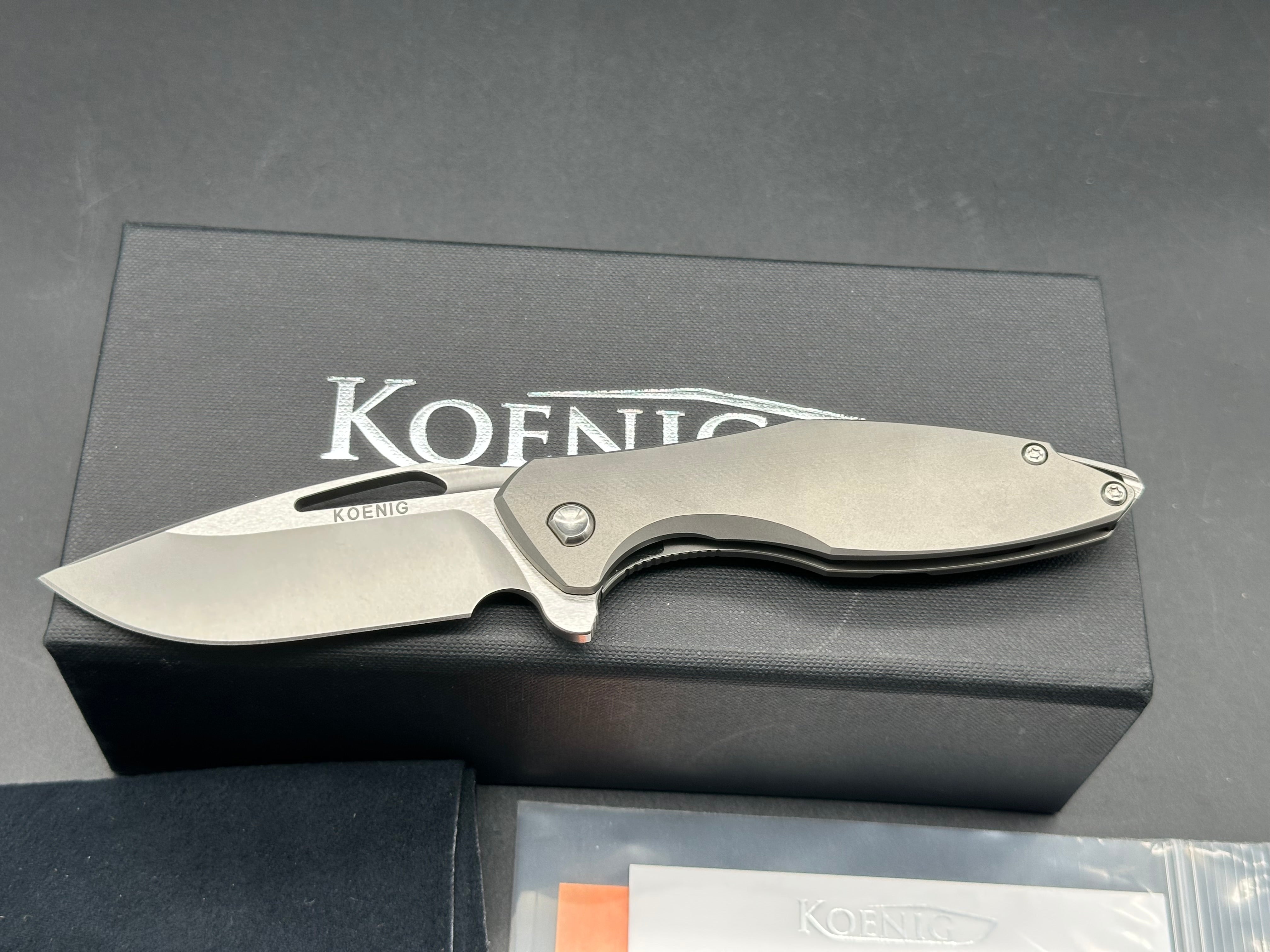 Koenig Mini Arius, M390 Blade - Burnished with Polished Flats, Smooth Ti Handles