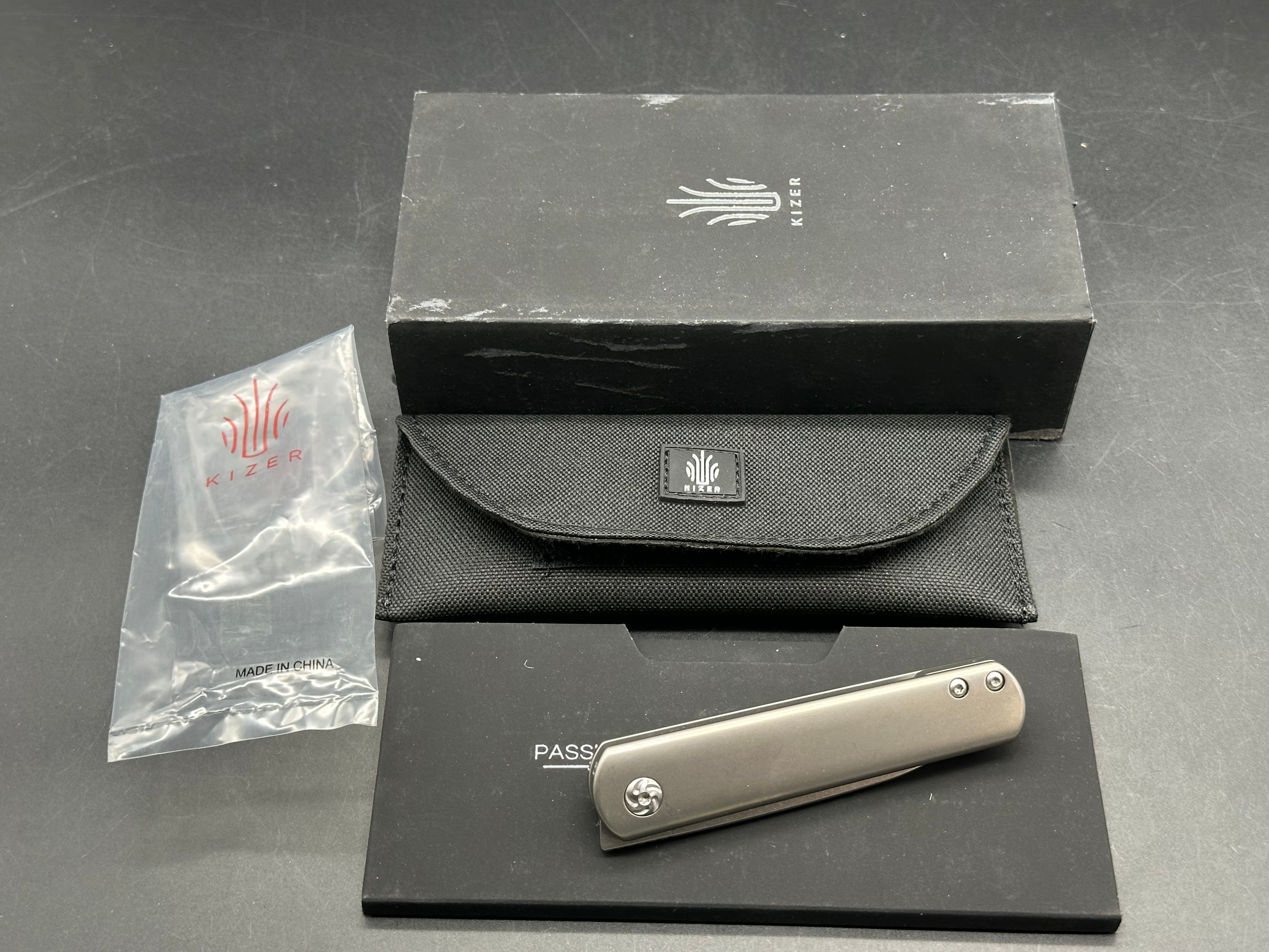 Kizer Feist: Justin Lundquist design. 2.75 inch tumbled CPM-S35VN blade