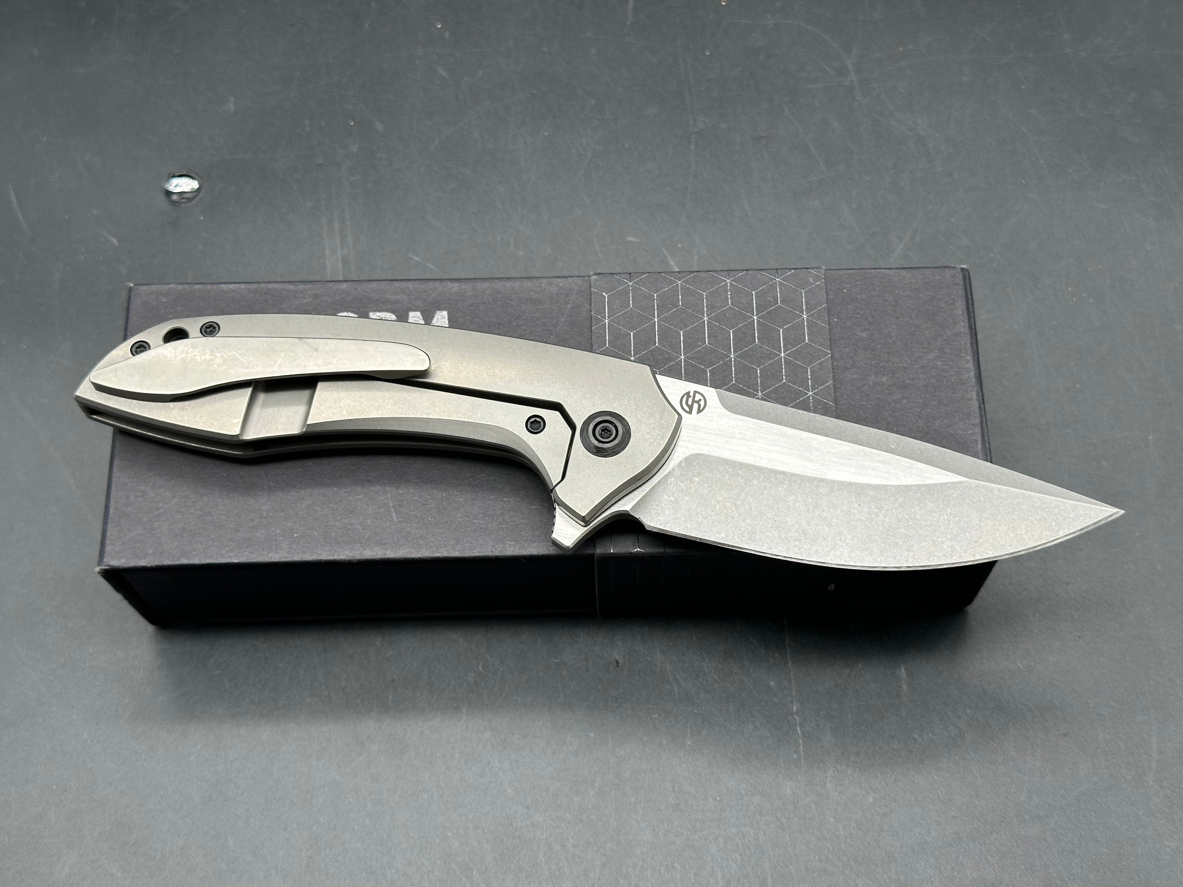 Arcform Catalyst: Geoff Blauvelt design. 3.5 inch CPM-S35VN blade. Frame lock. Titanium and carbon fiber handle