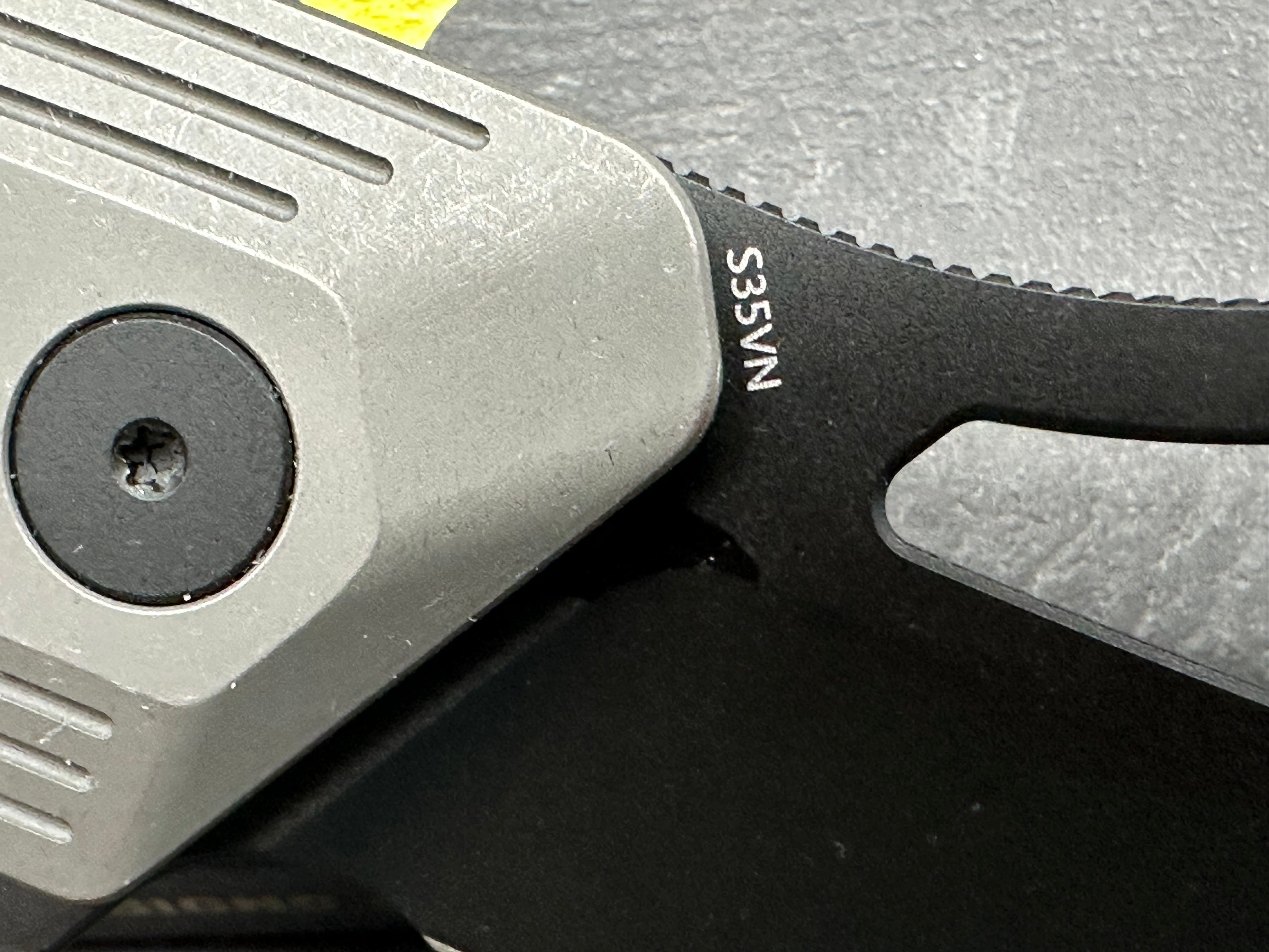 Damned Designs Banshee: 3.1 inch hollow grind, stonewashed, blackwashed CPM-S35VN blade. Ceramic ball bearings
