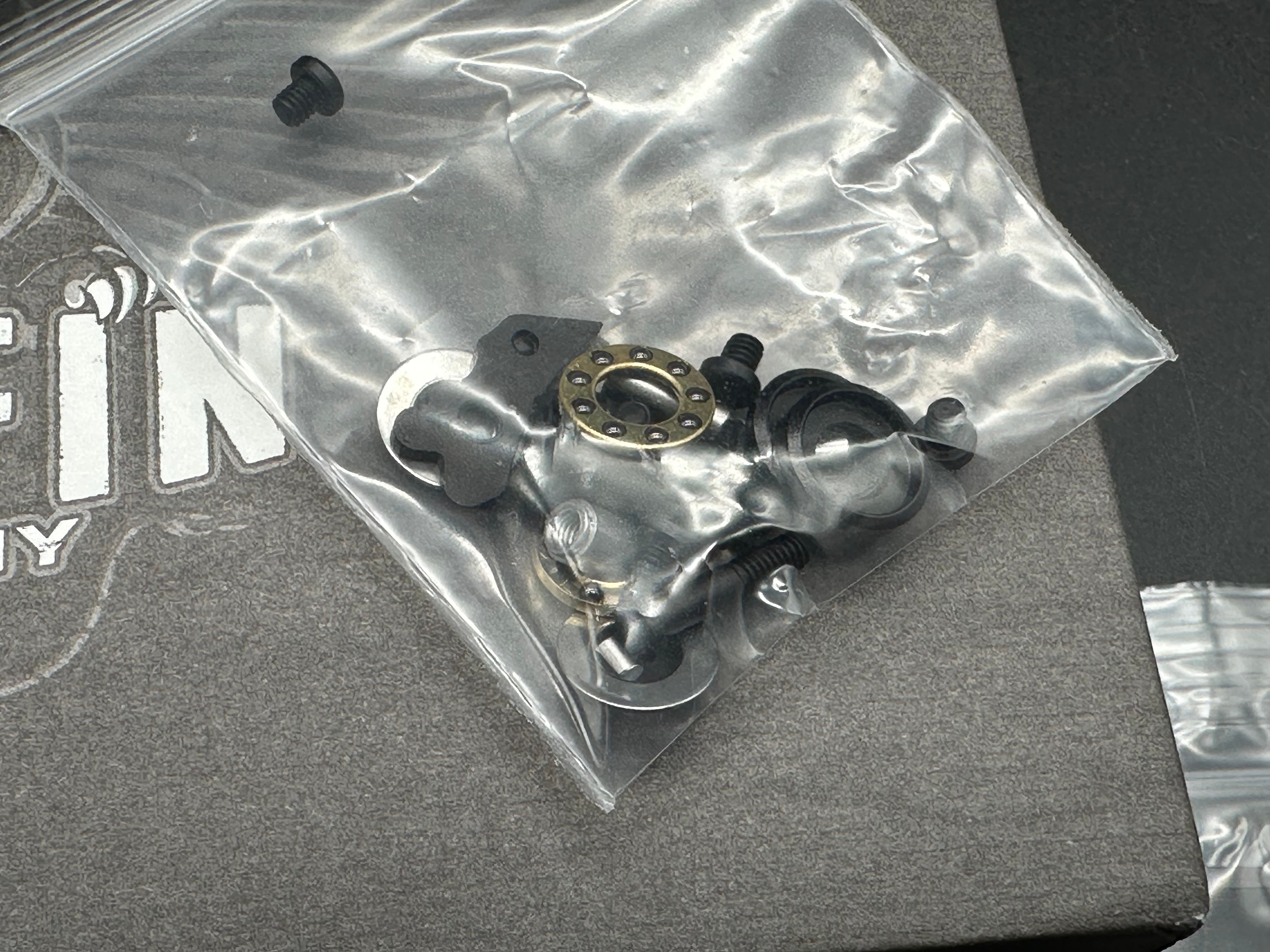 Griffin Company X Series Bolster Lock, Blackwashed CPM Magnacut Blade, Blackwashed Ti Bolster Lock with Marbled Carbon Fiber