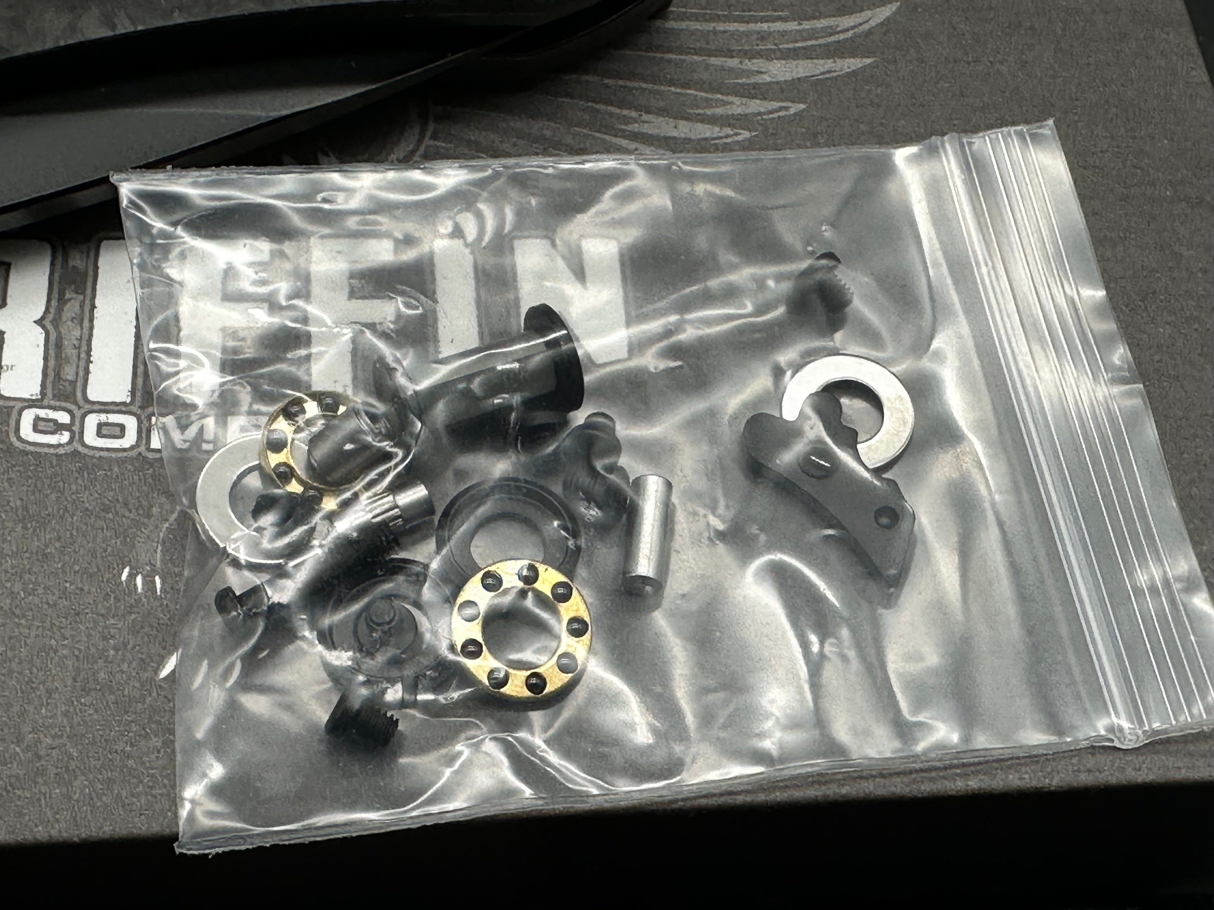 Griffin Company X Series Bolster Lock, Blackwashed CPM Magnacut Blade, Blackwashed Ti Bolster Lock with Marbled Carbon Fiber