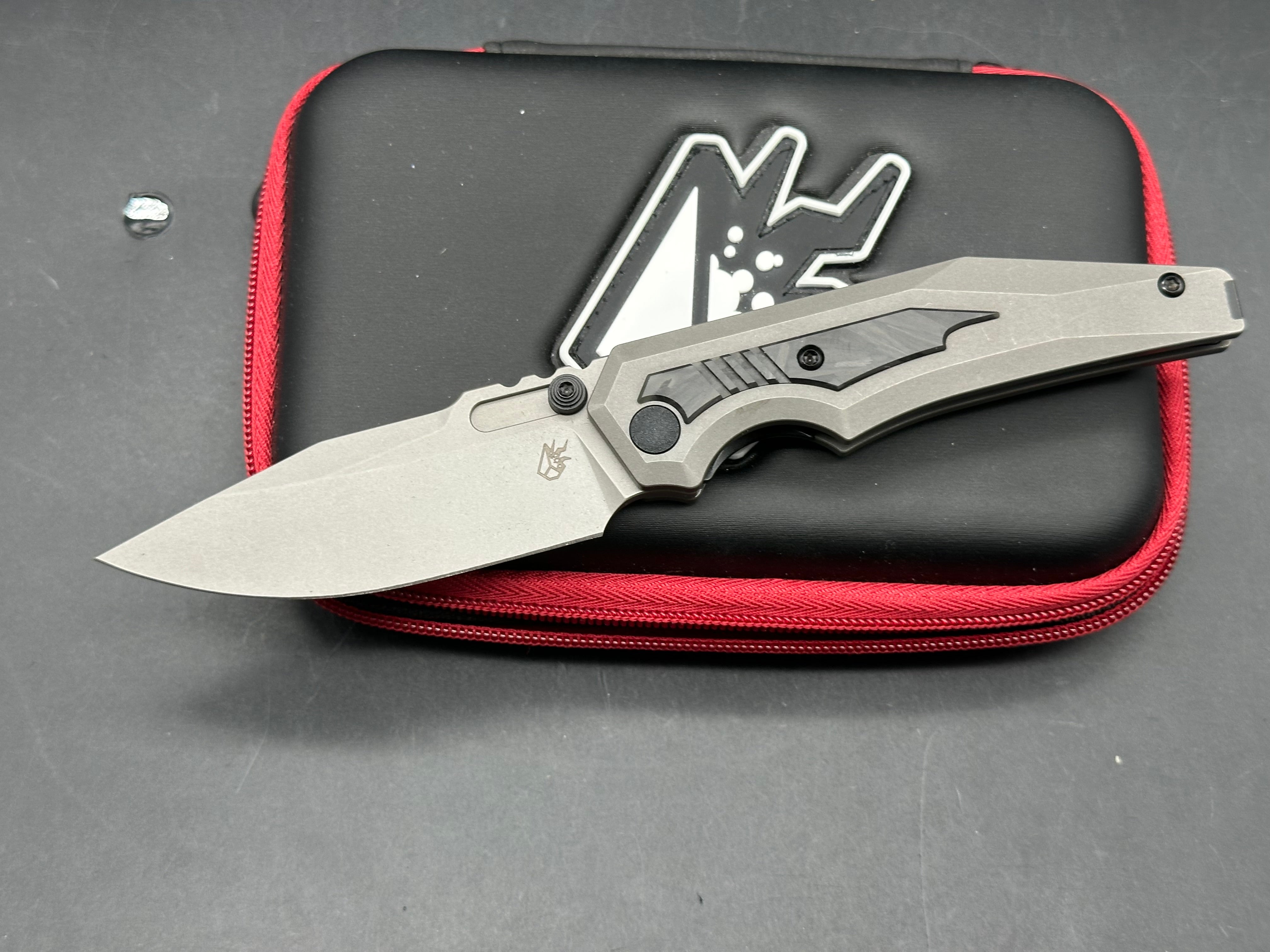 Arcane Designs Preytheon 3.125 inch acid etched, tumbled CPM-20CV blade. Milled and tumbled titanium frame