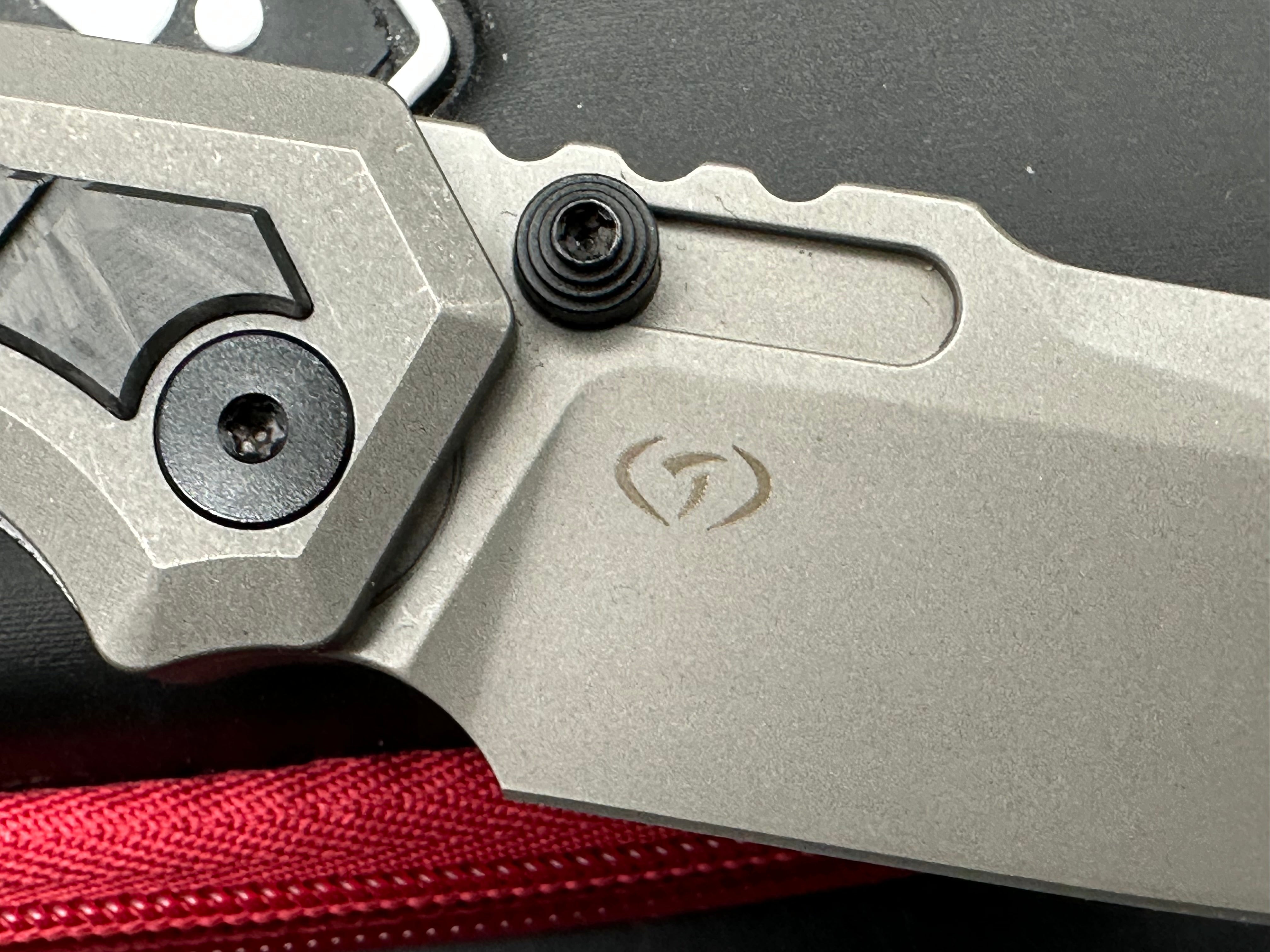 Arcane Designs Preytheon 3.125 inch acid etched, tumbled CPM-20CV blade. Milled and tumbled titanium frame