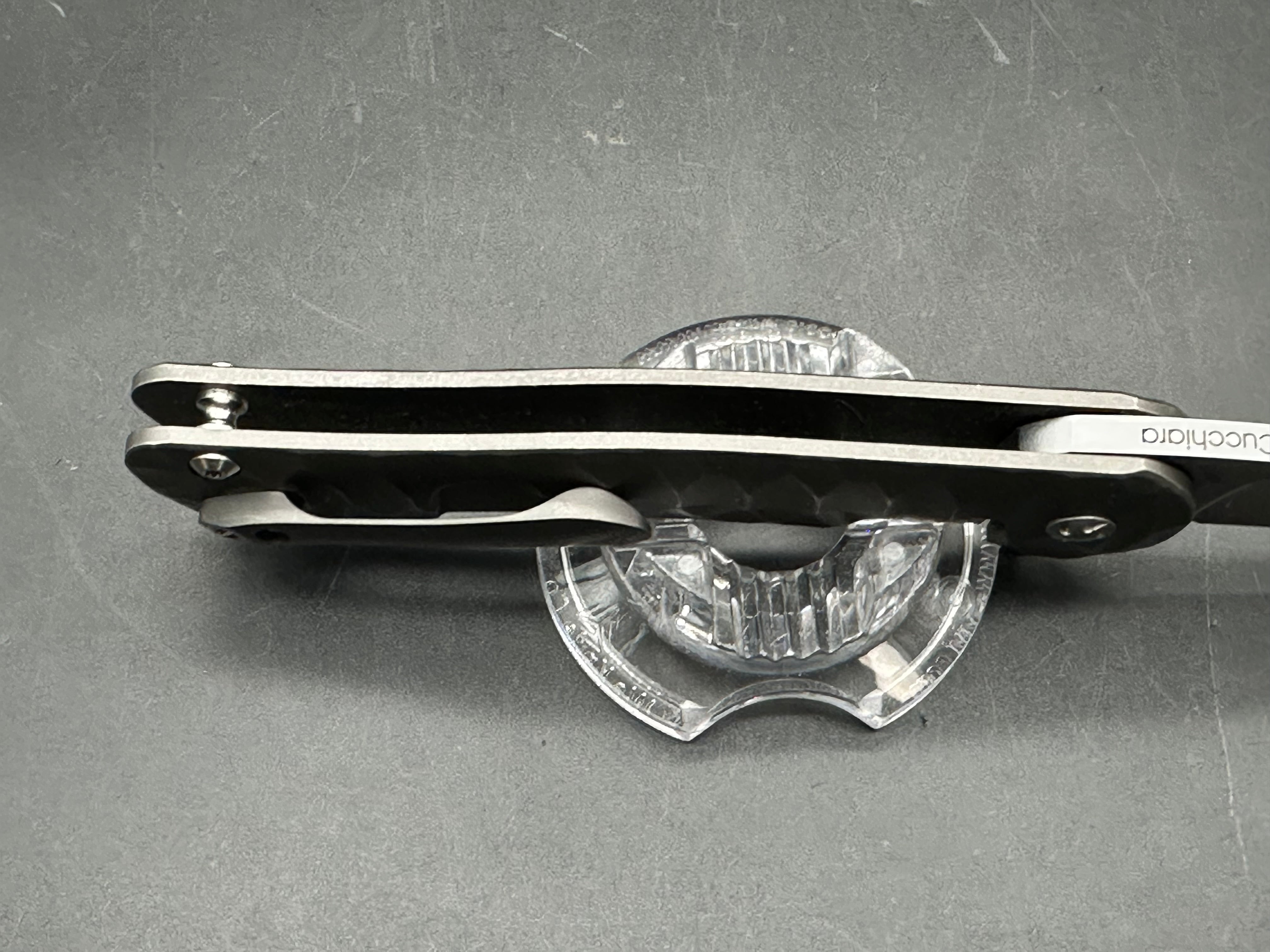 Kizer Dukes Large Matt Cuchiara design. 3.5 inch satin finish CPM-S35VN blade. Milled titanium frame