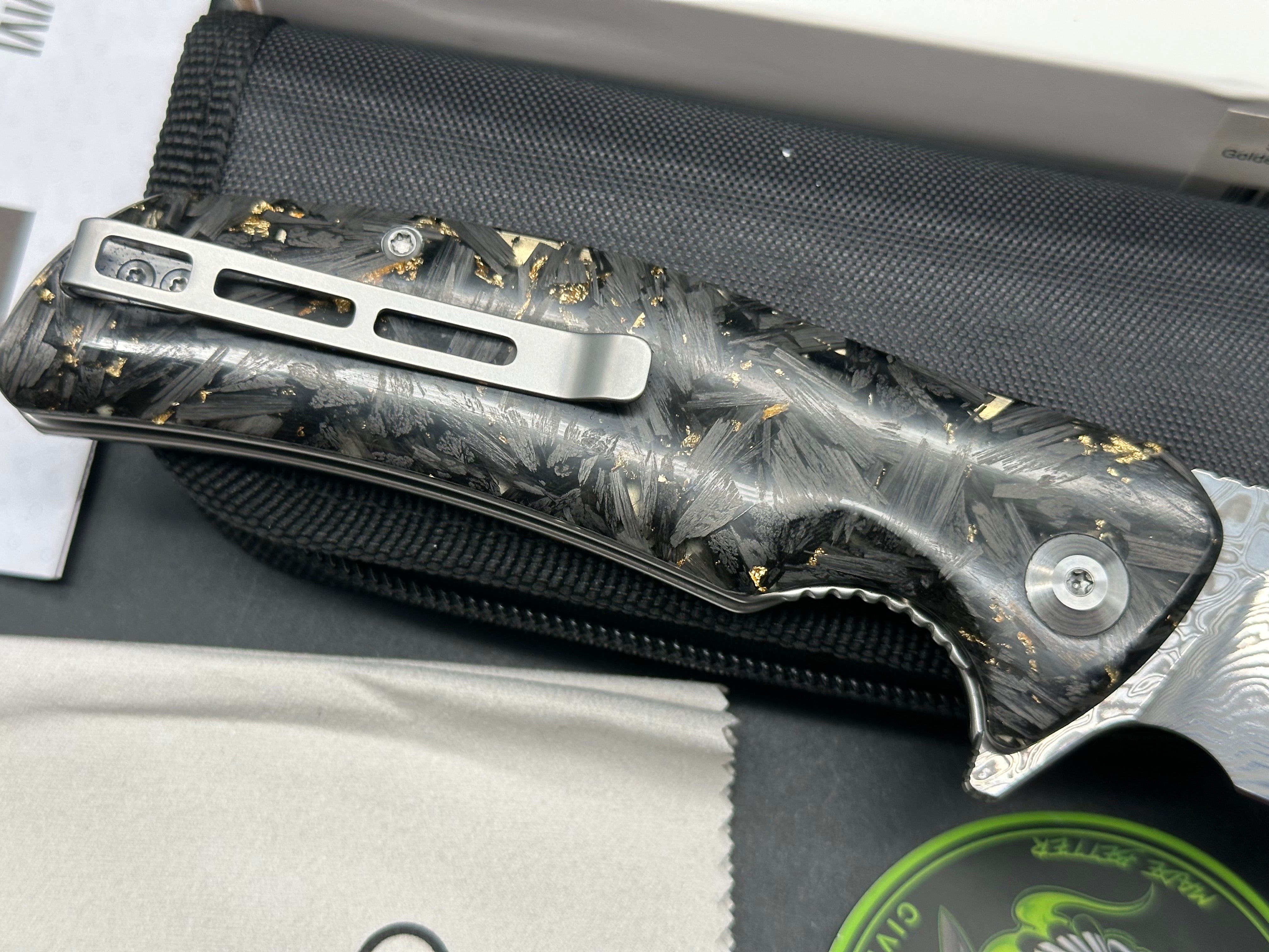 Civivi Incite Shredded Carbon Fiber and Golden Shred in Clear Resin