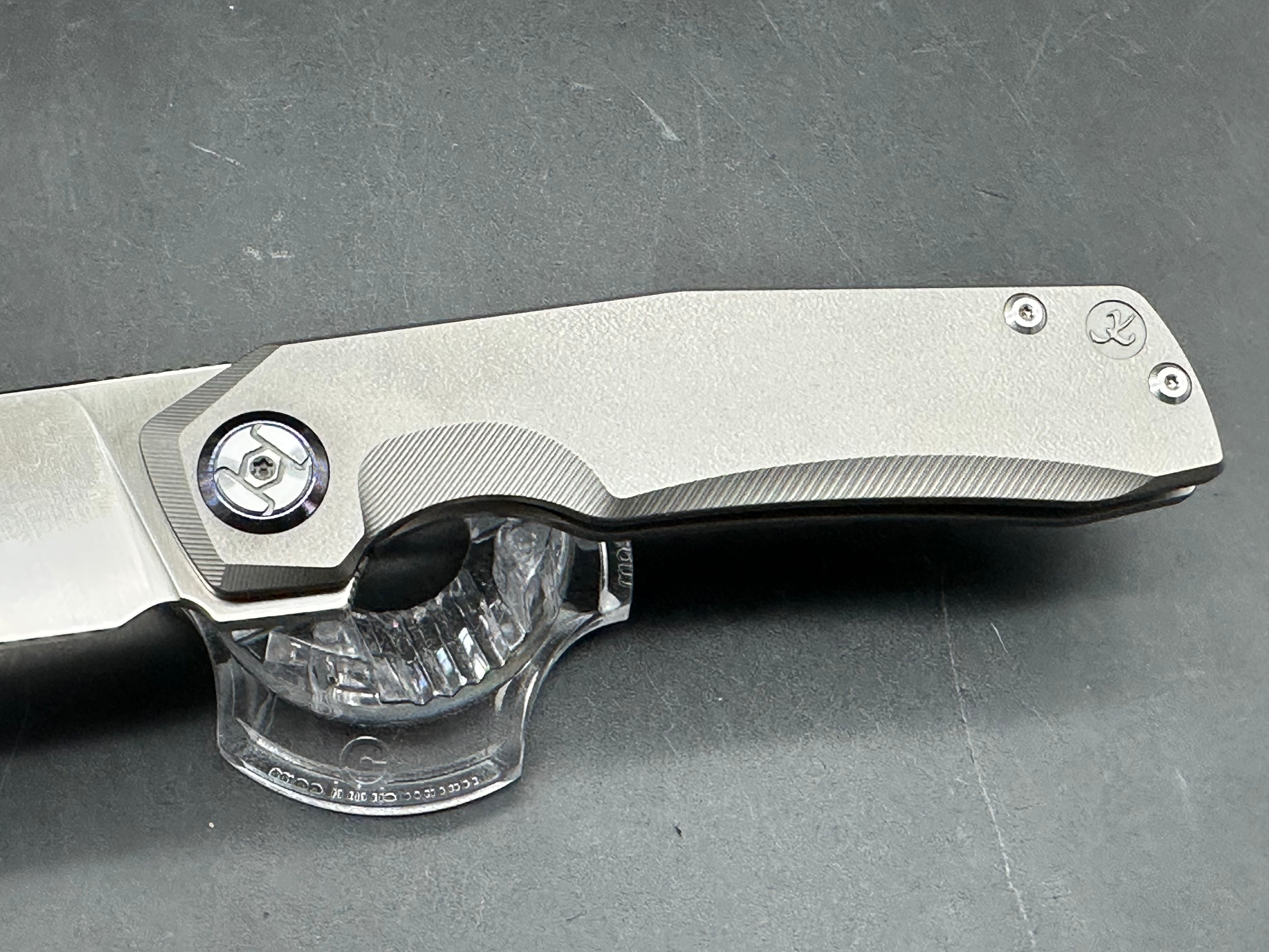 Kunwu Large Tao 3.5 inch satin finished, Bohler M390 blade. Textured titanium frame