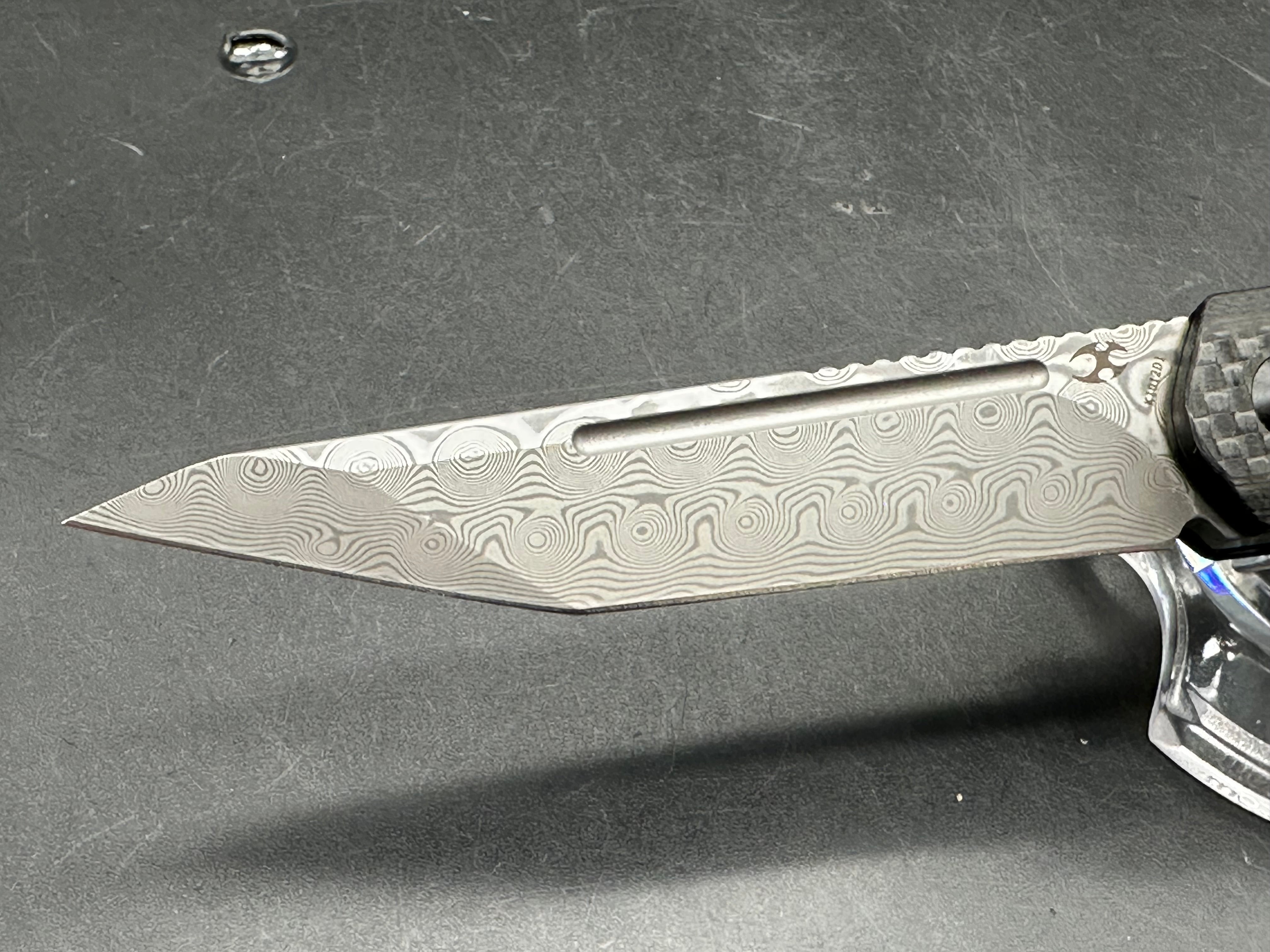 Kansept Prickle 3.5 inch Damascus blade. Carbon fiber scales
