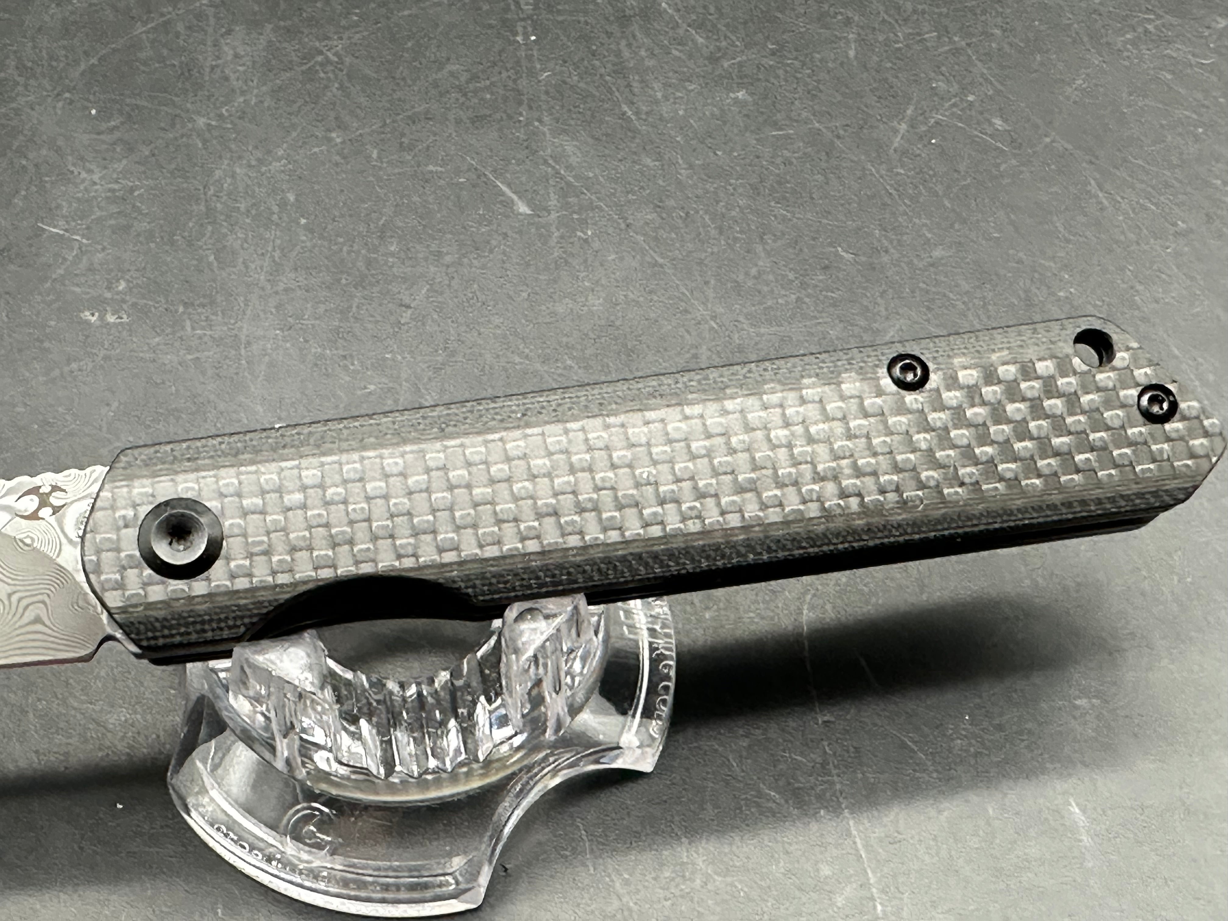 Kansept Prickle 3.5 inch Damascus blade. Carbon fiber scales