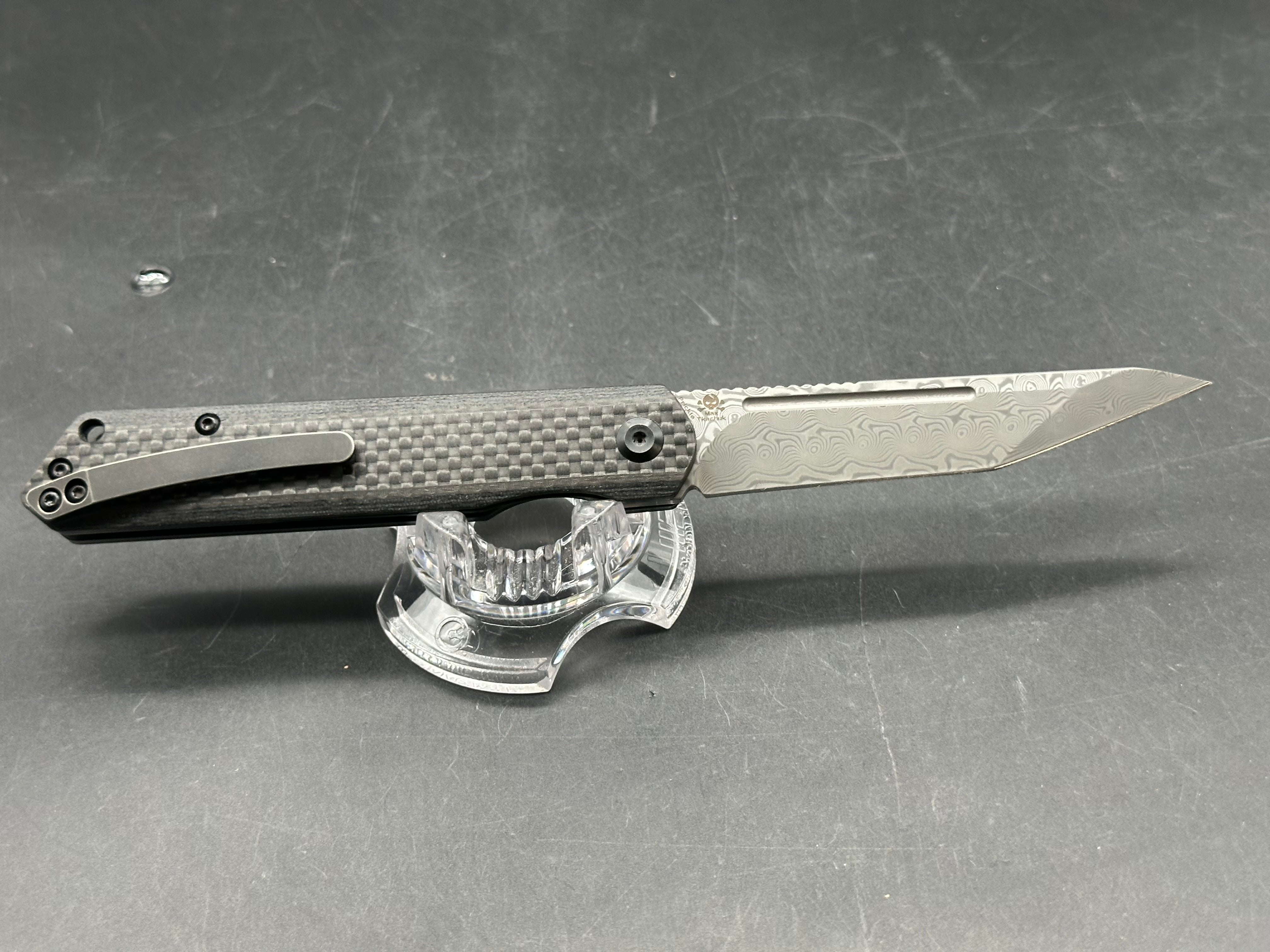 Kansept Prickle 3.5 inch Damascus blade. Carbon fiber scales