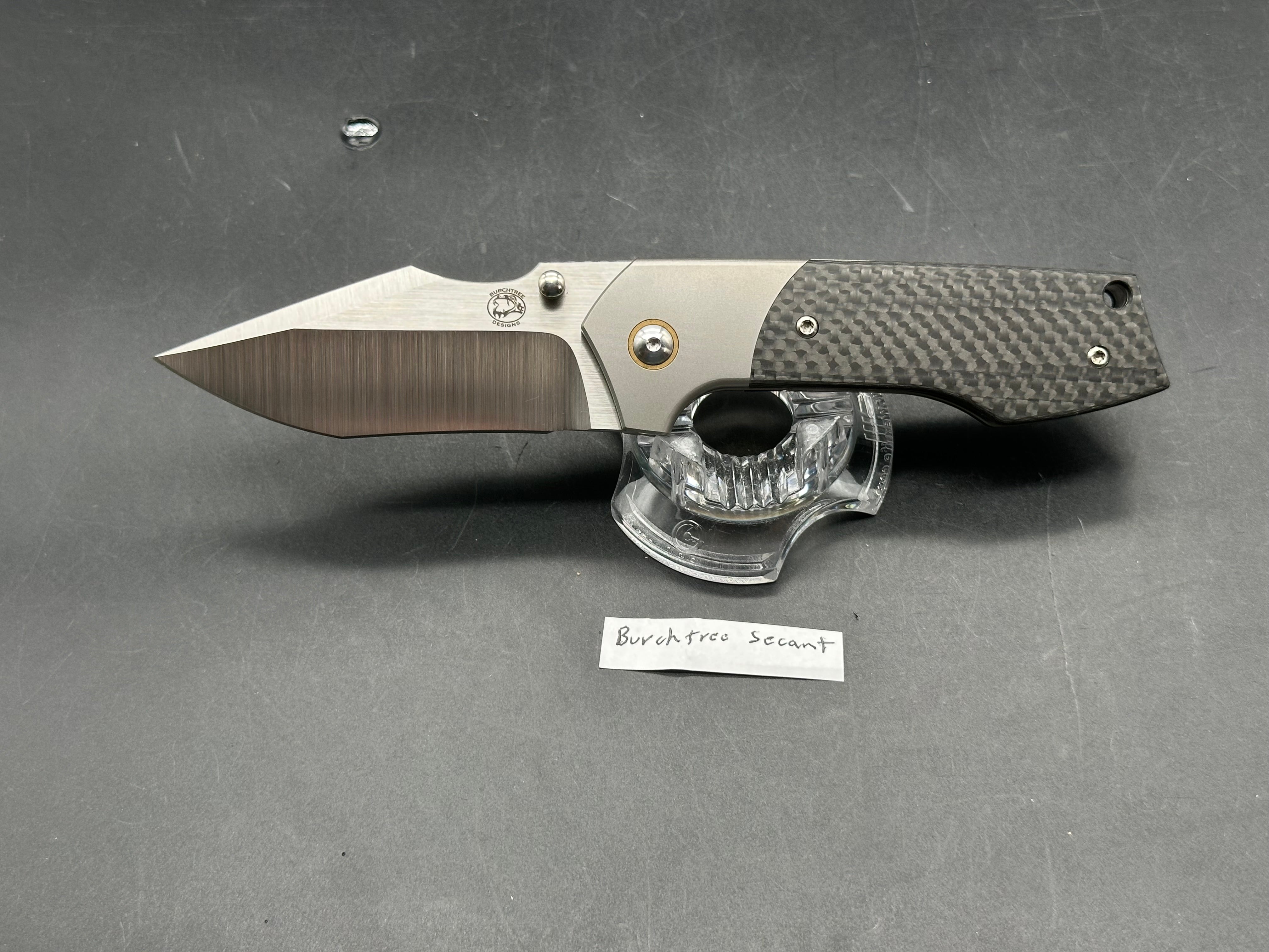 Burchtree Designs Secant Michael Burch design. 3.125 inch satin Bohler M390 blade. Titanium and carbon fiber frame