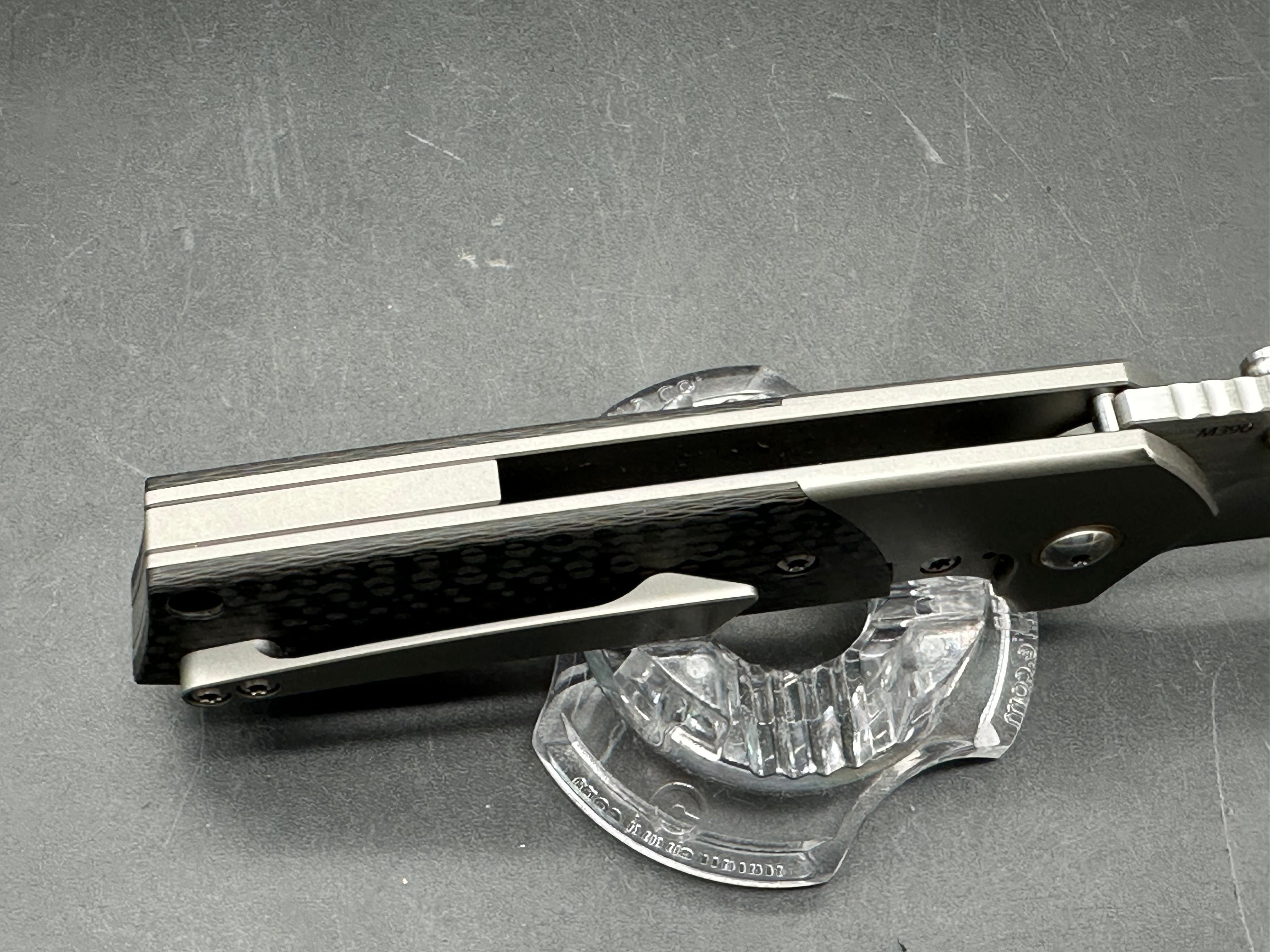 Burchtree Designs Secant Michael Burch design. 3.125 inch satin Bohler M390 blade. Titanium and carbon fiber frame