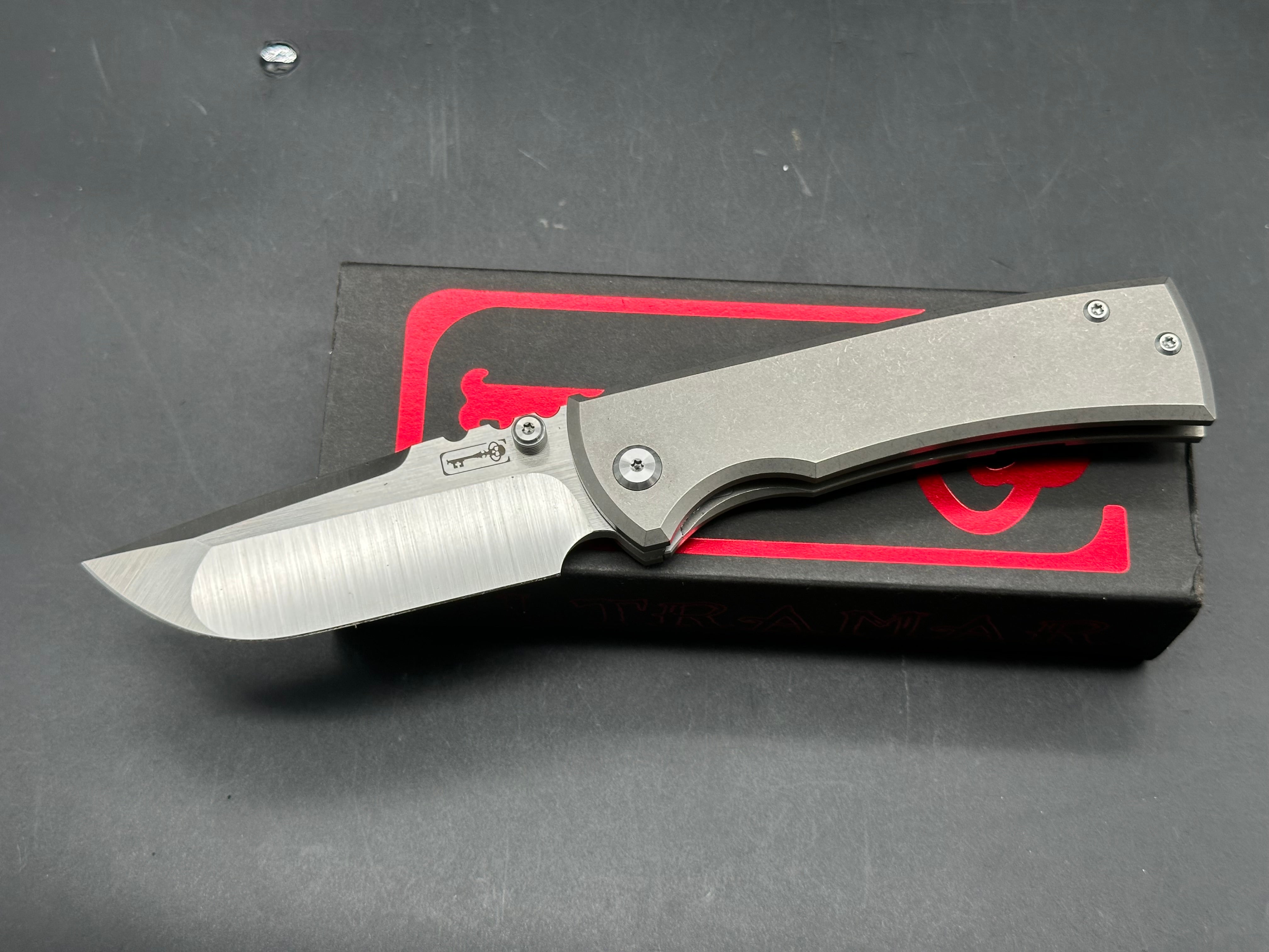 Chaves Redencion 229 3.625 inch drop point, satin finish, stonewashed Bohler M390 blade. Titanium frame