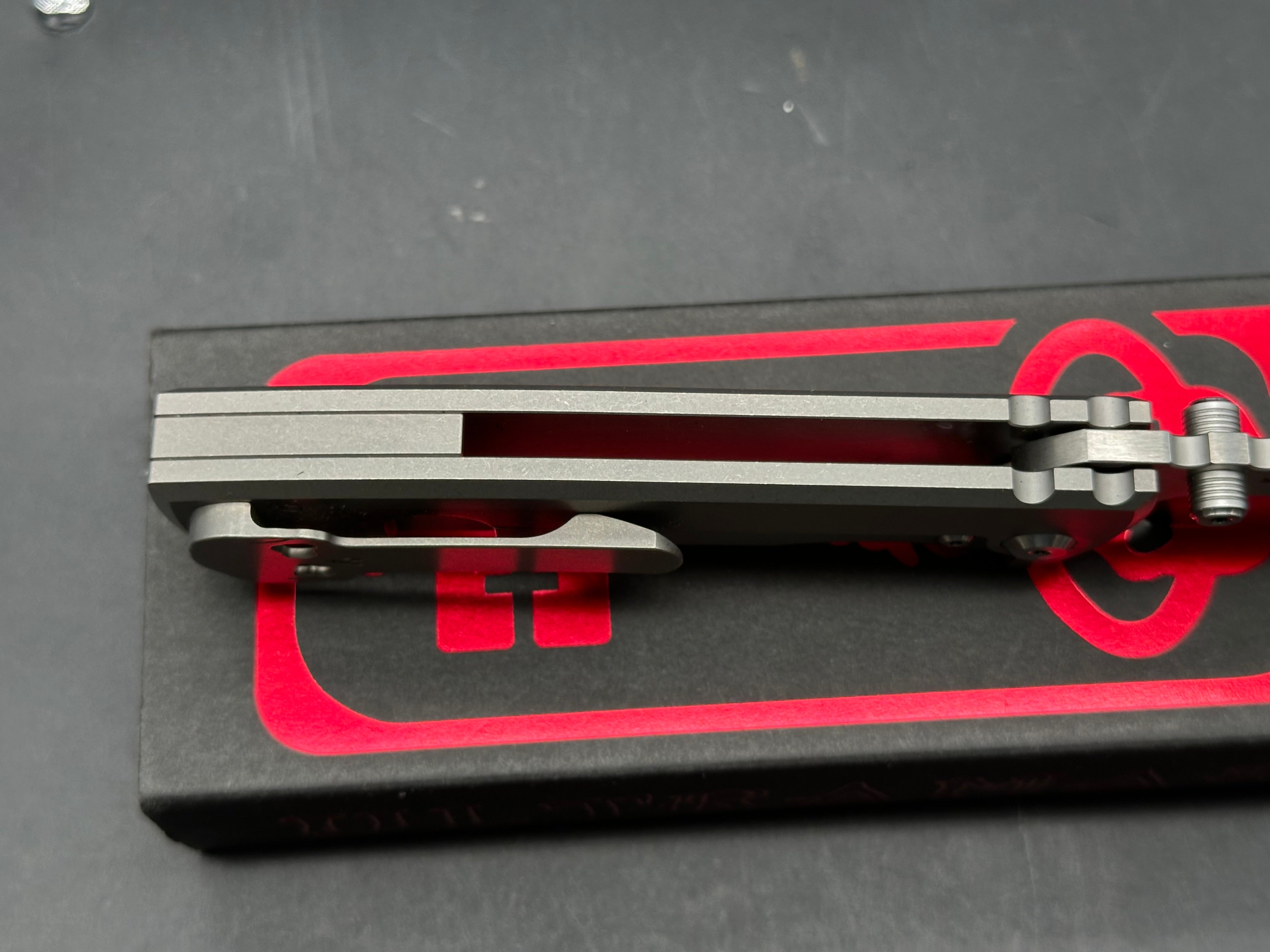 Chaves Redencion 229 3.625 inch drop point, satin finish, stonewashed Bohler M390 blade. Titanium frame