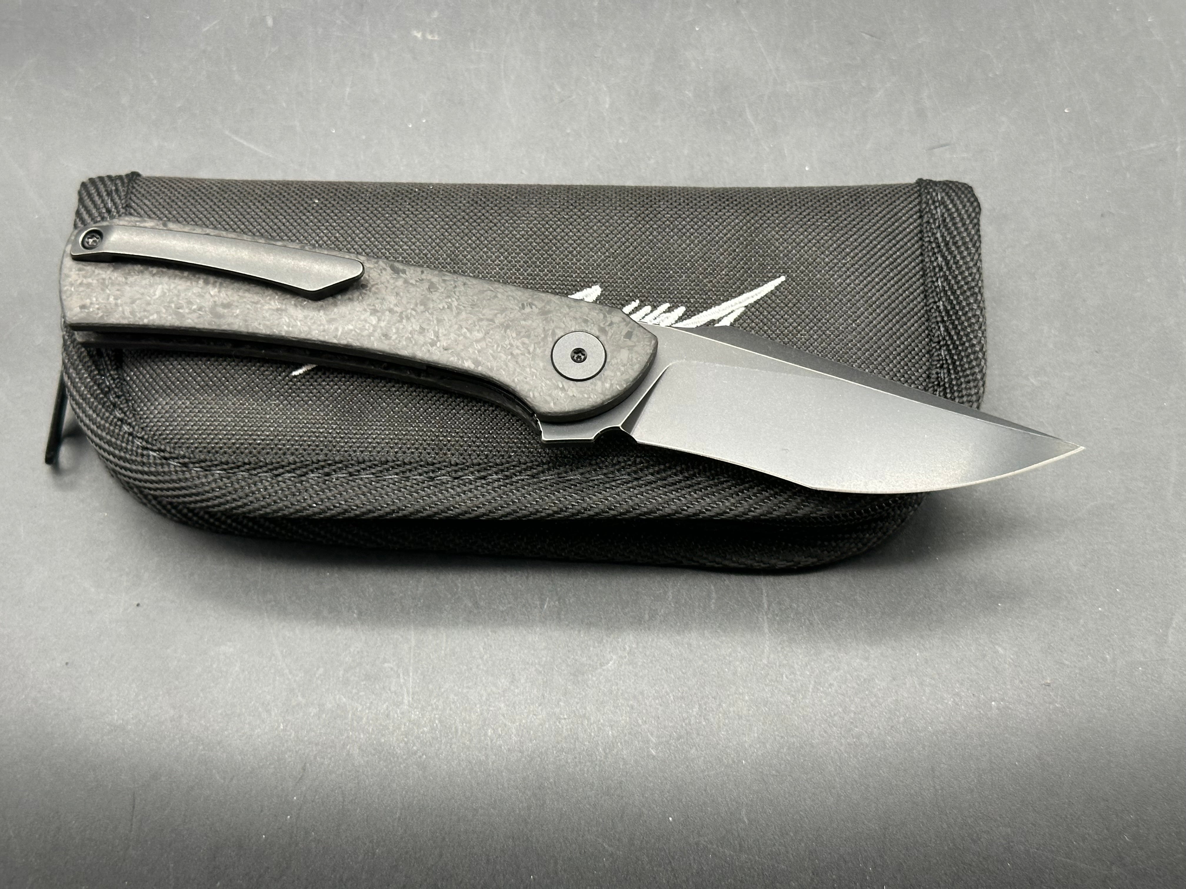 Daniel Carraher Jax 3.3 inch blackwashed PVD Bohler M390 blade. Carbon fiber scales