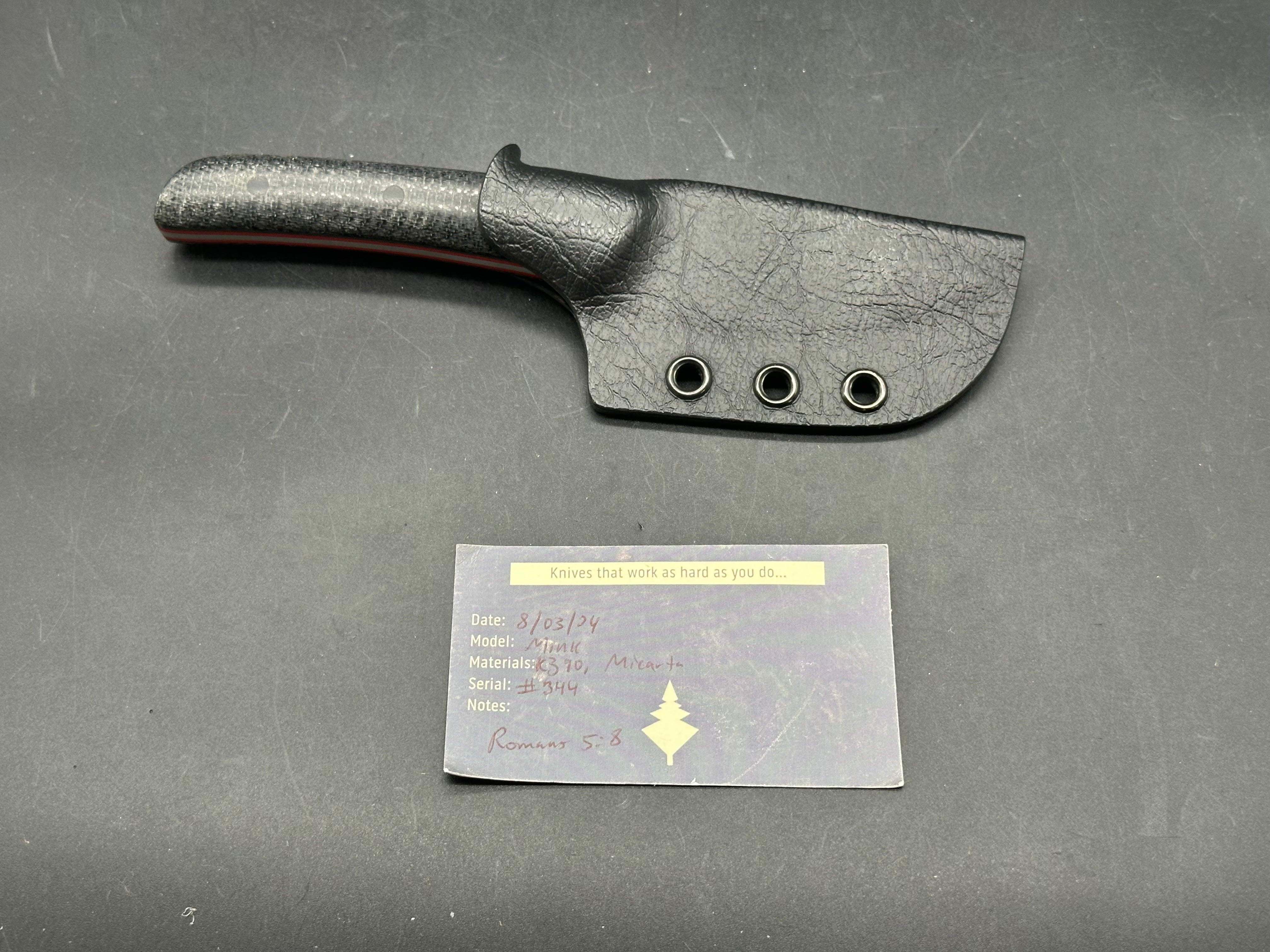 Northern Knifeworks Mink K390. Black Micarta scales with red G-10 liners. Tru-Hide kydex sheath