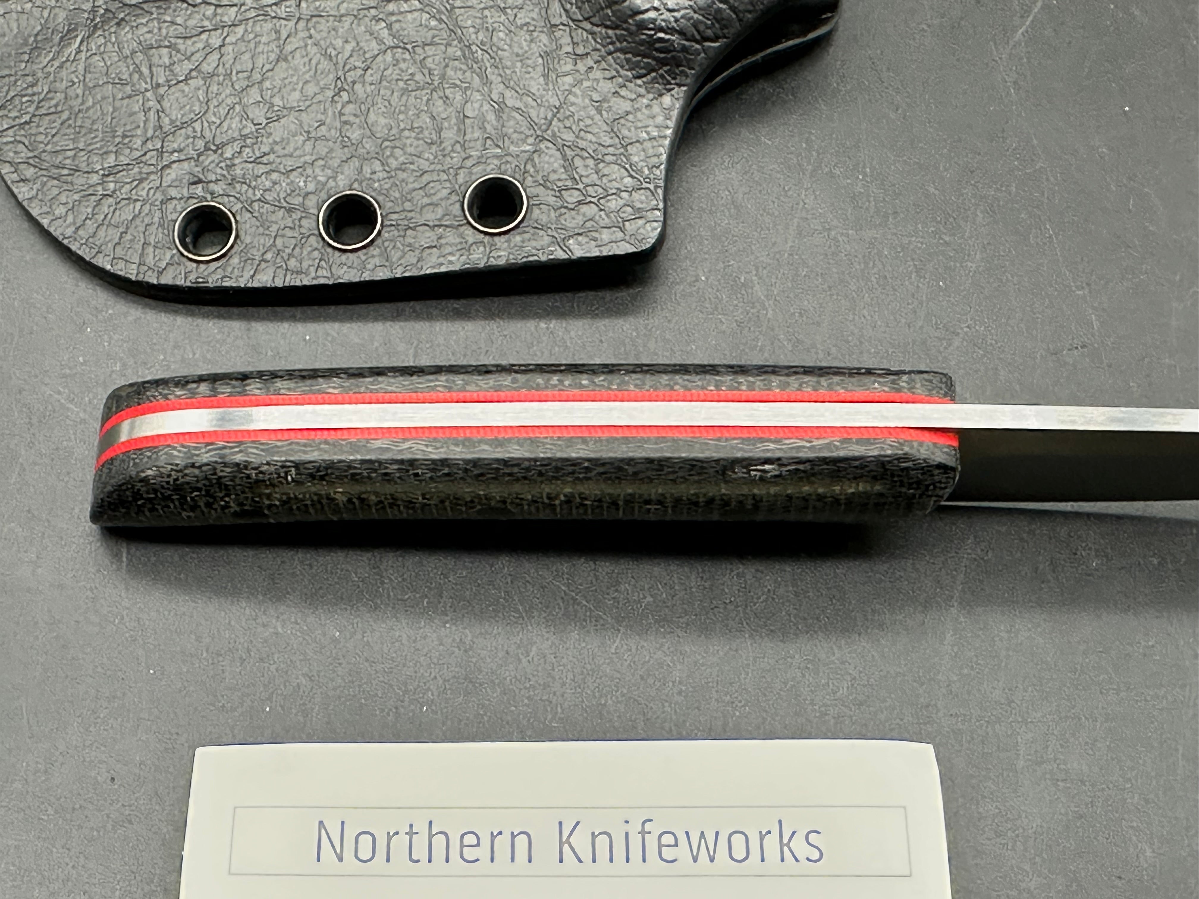 Northern Knifeworks Mink K390. Black Micarta scales with red G-10 liners. Tru-Hide kydex sheath